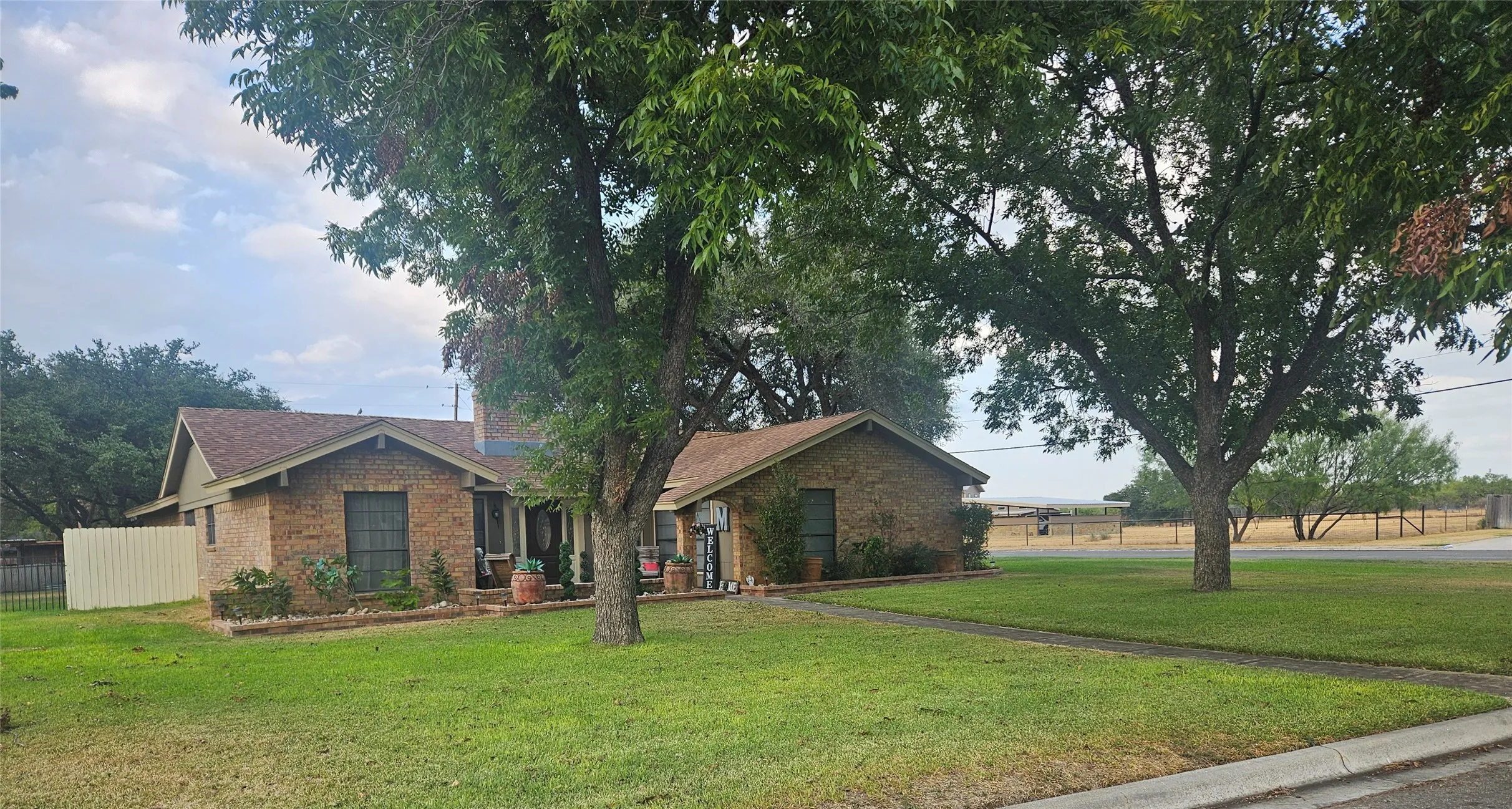 Mature trees in the front yard.