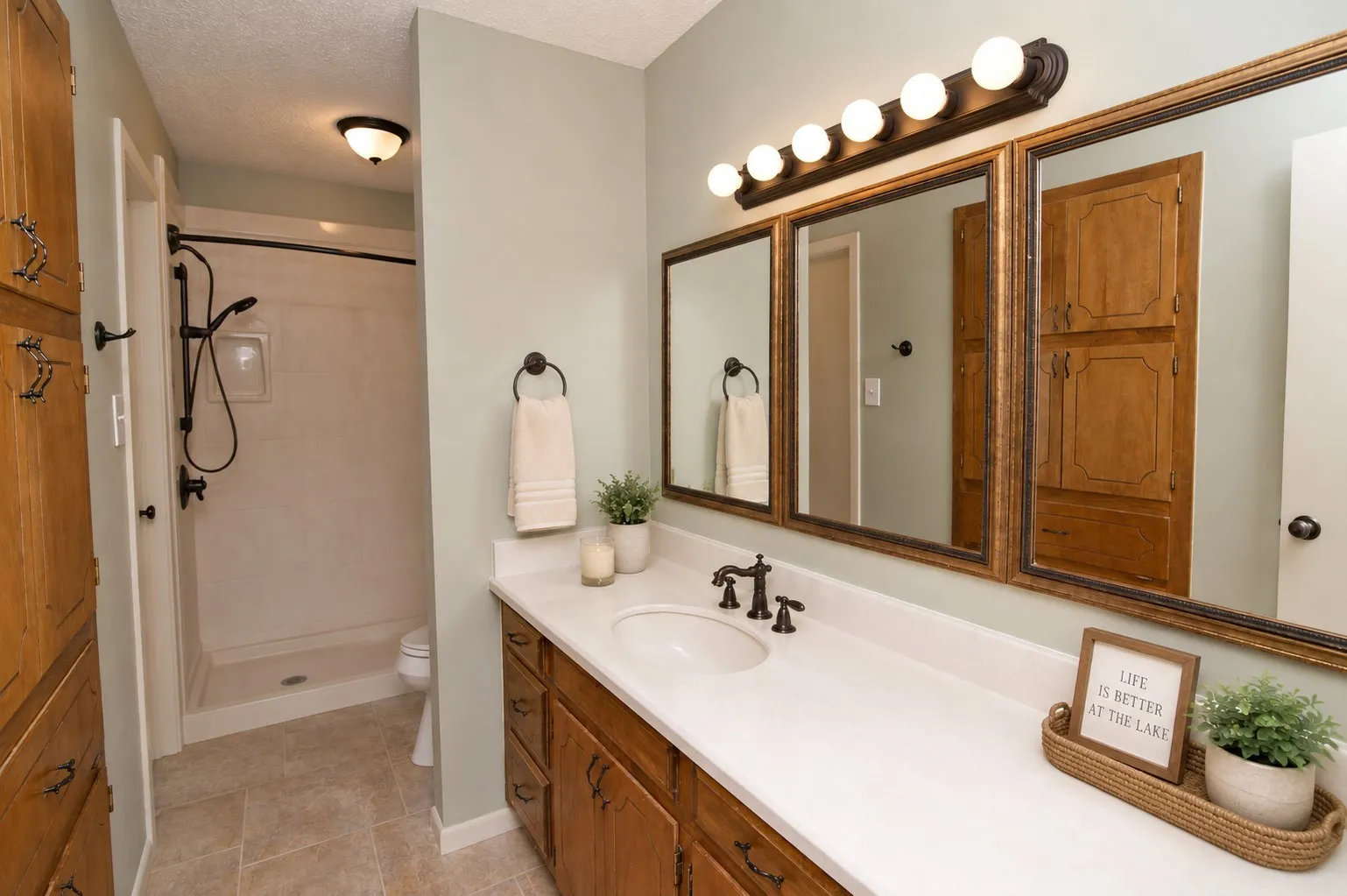 Expansive vanity with a white countertop and integrated sink