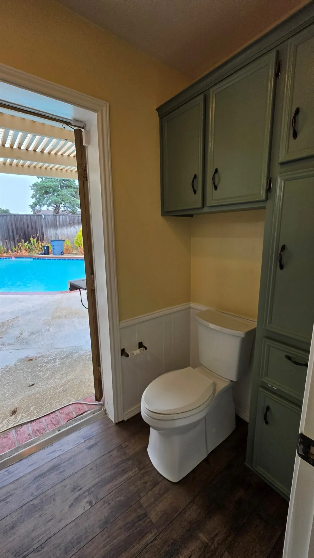 Primary bath has separate shower & toilet area that opens to pool area