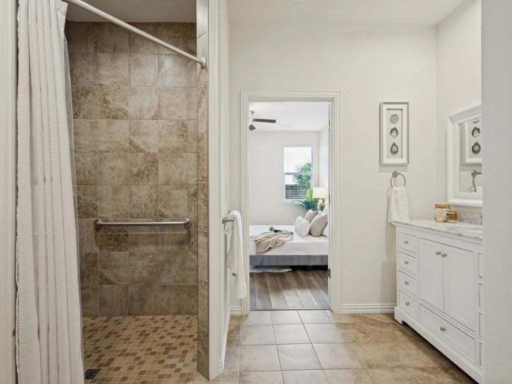 The primary shower is huge! Wheel chair assessable, and upgraded tile.