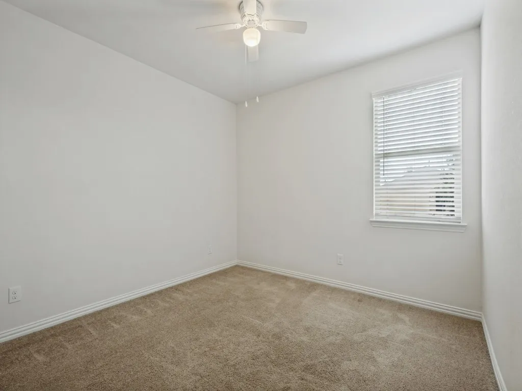 All bedrooms have window treatments too!