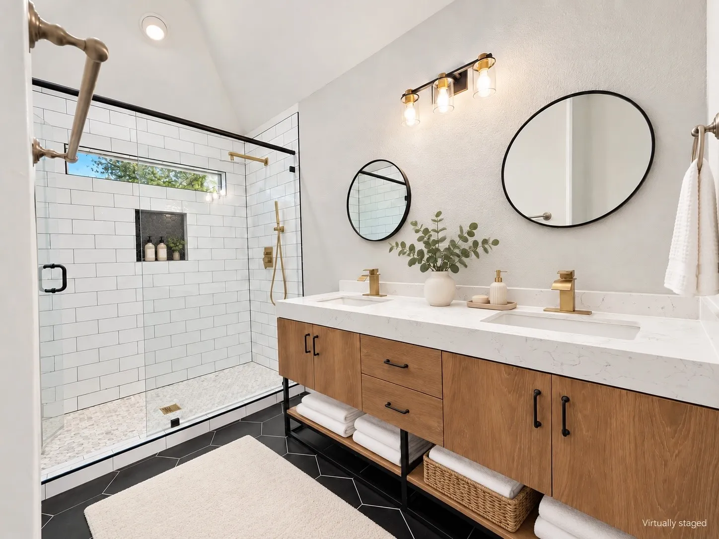 Dual vanity with wood-finish cabinetry and white countertops