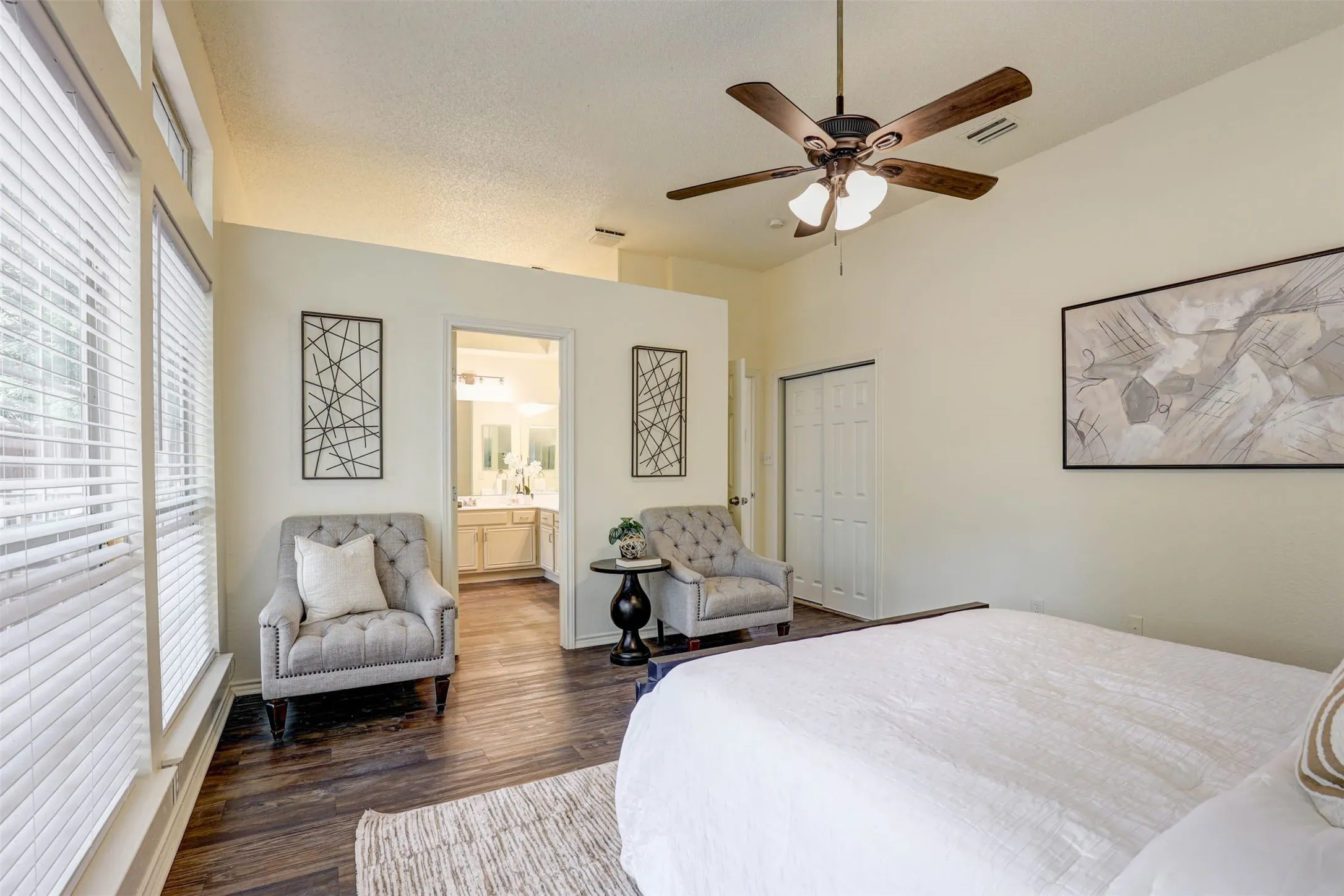 Spacious master bedroom has lots of room for more furniture.