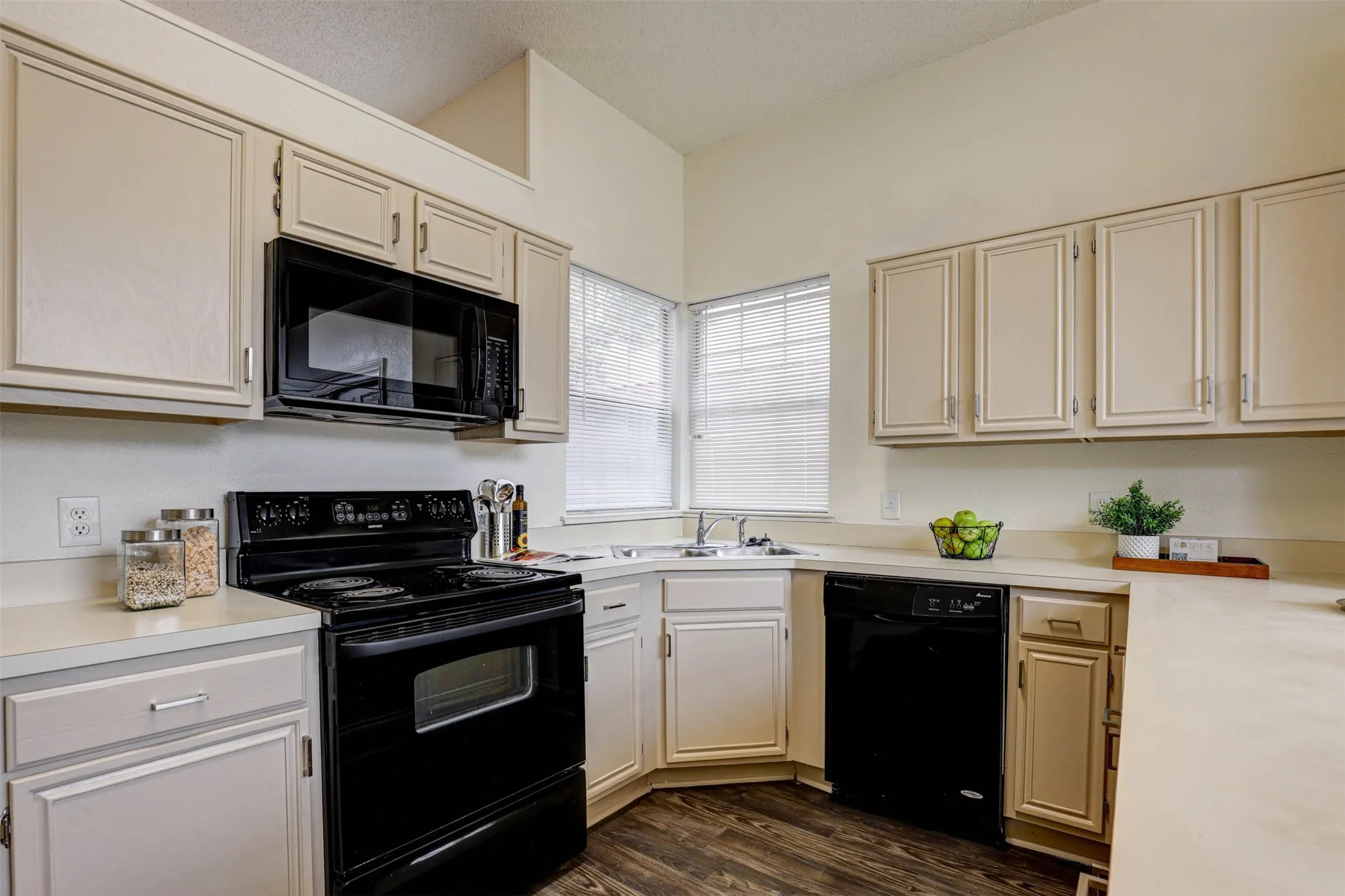 Freshly refinished cabinetry and generous prep space make this kitchen as beautiful as it is practical.