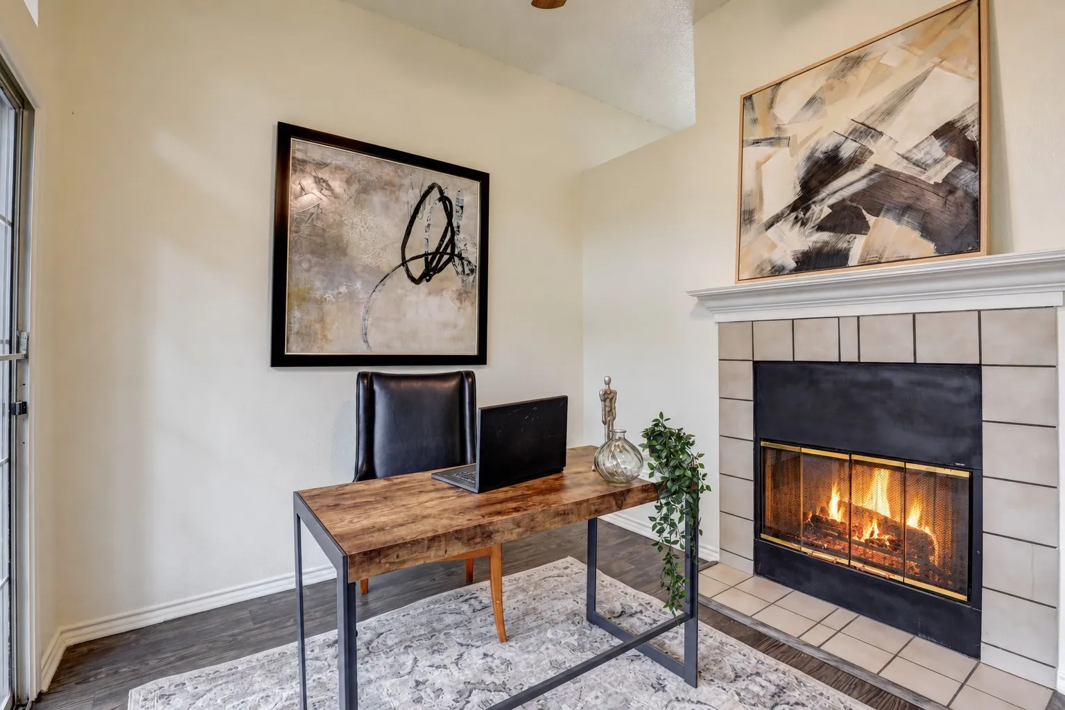 Sit back and enjoy the fireplace in the second living area.