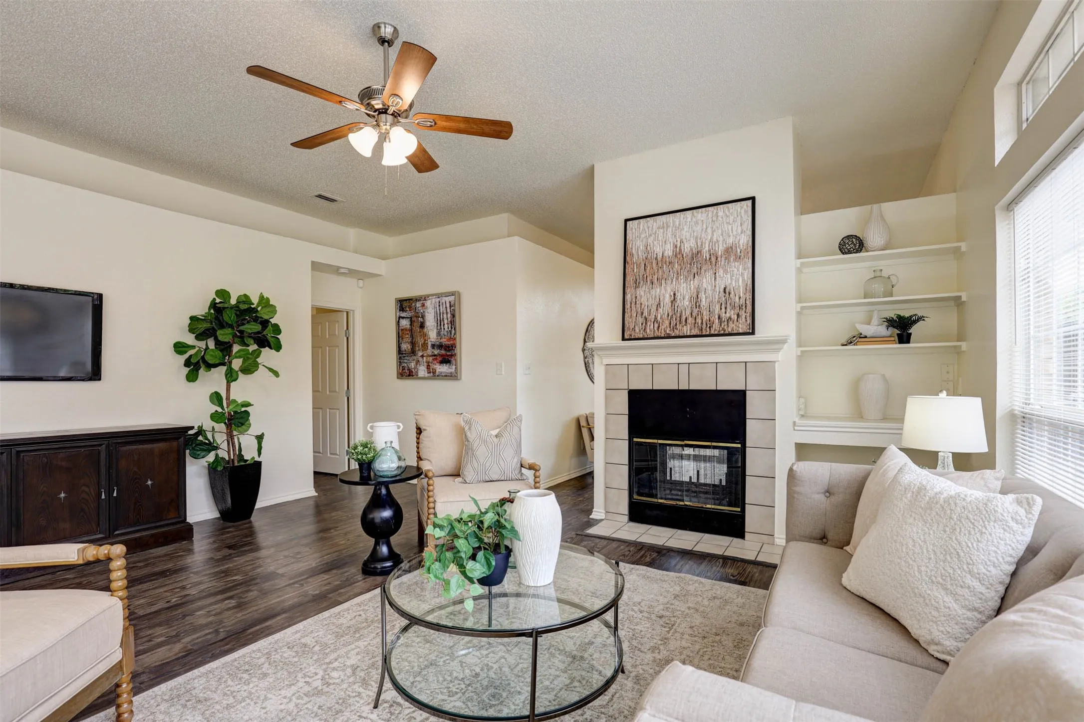 Double sided fireplace and built-in desk in the family room.