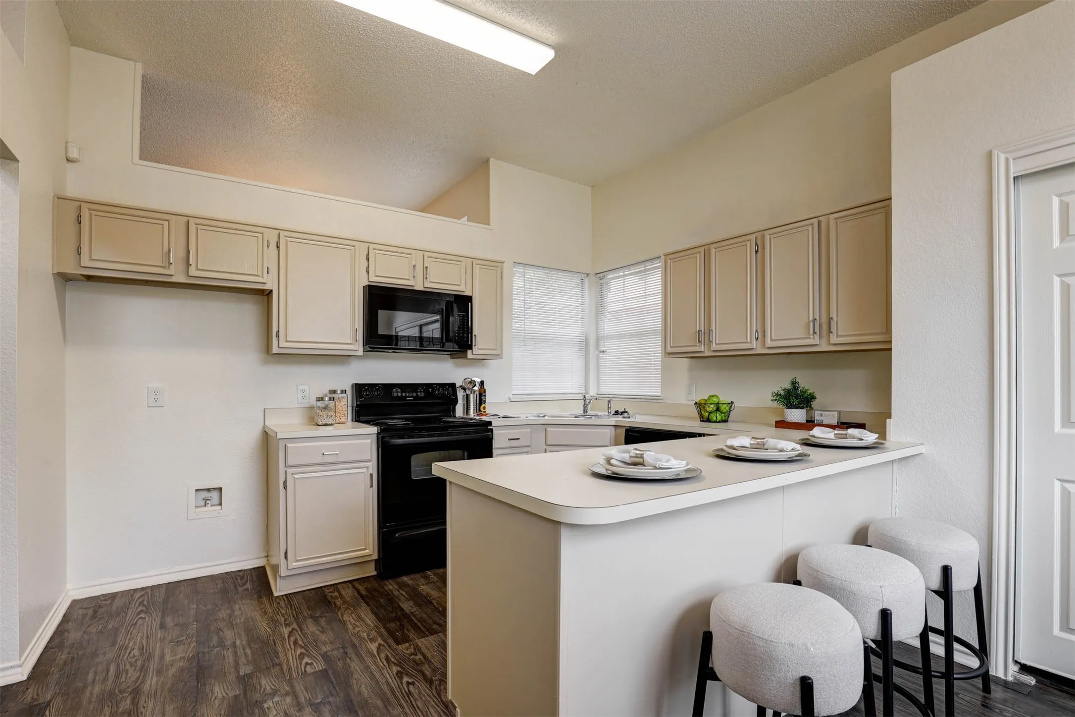 Bright and inviting breakfast nook creates the perfect spot to start your day.