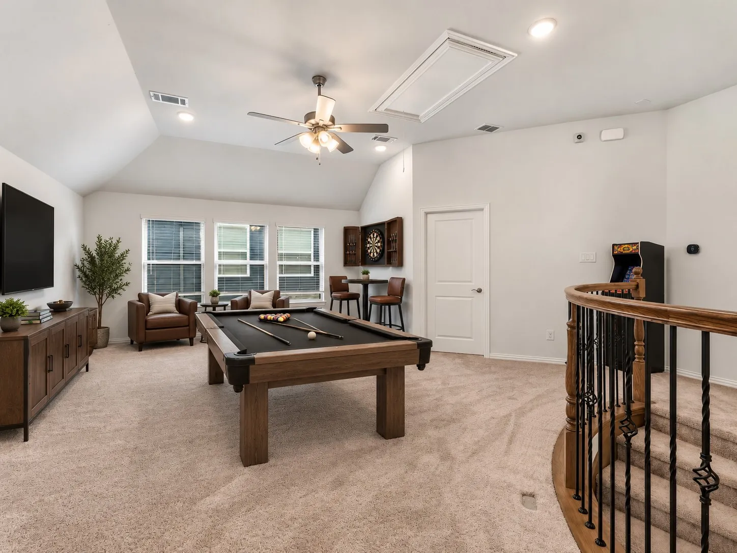 Upstairs gameroom that leads into the media room.