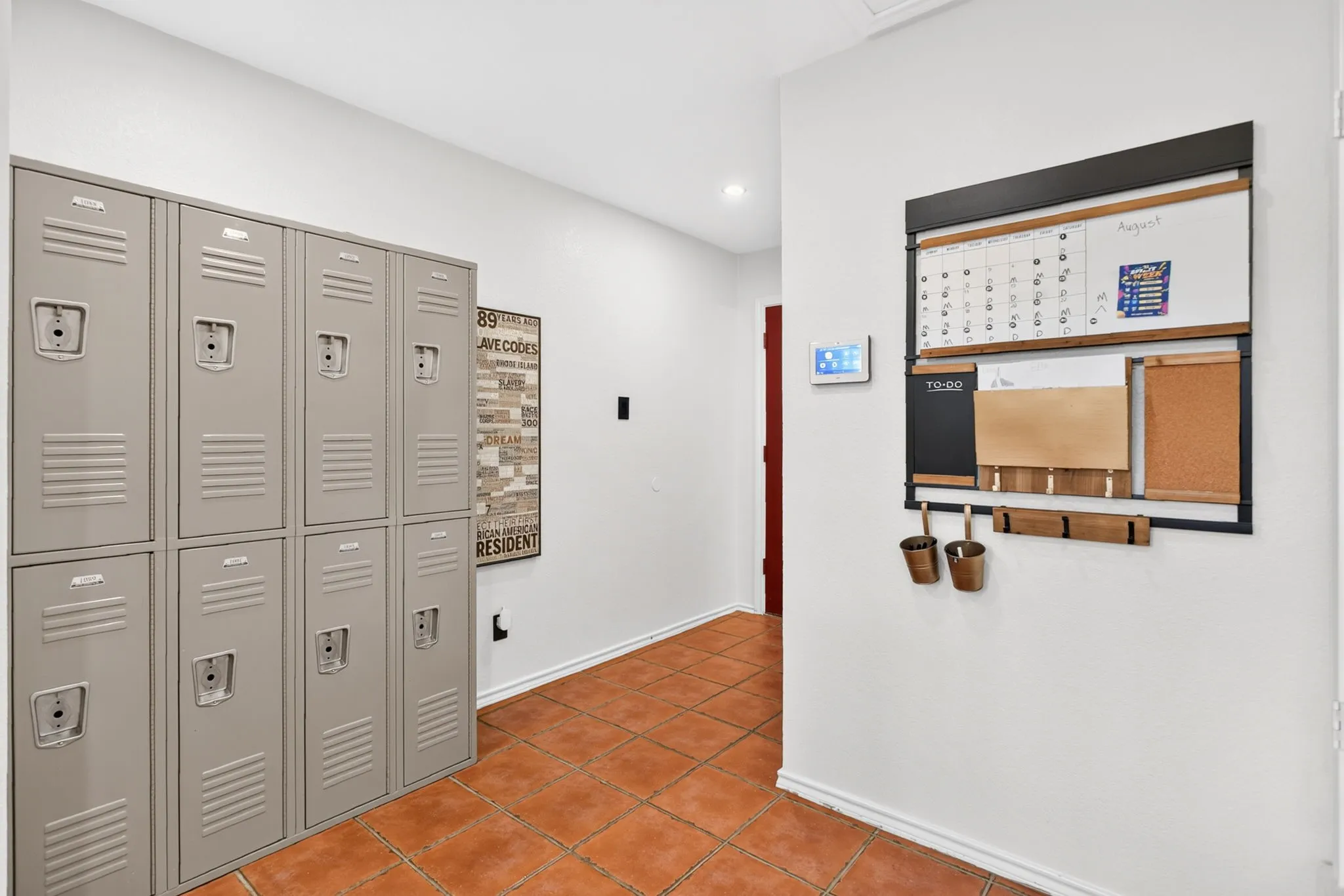 And on the other side of the home...a utilitarian space for storage and drop zone leading to the covered patio.