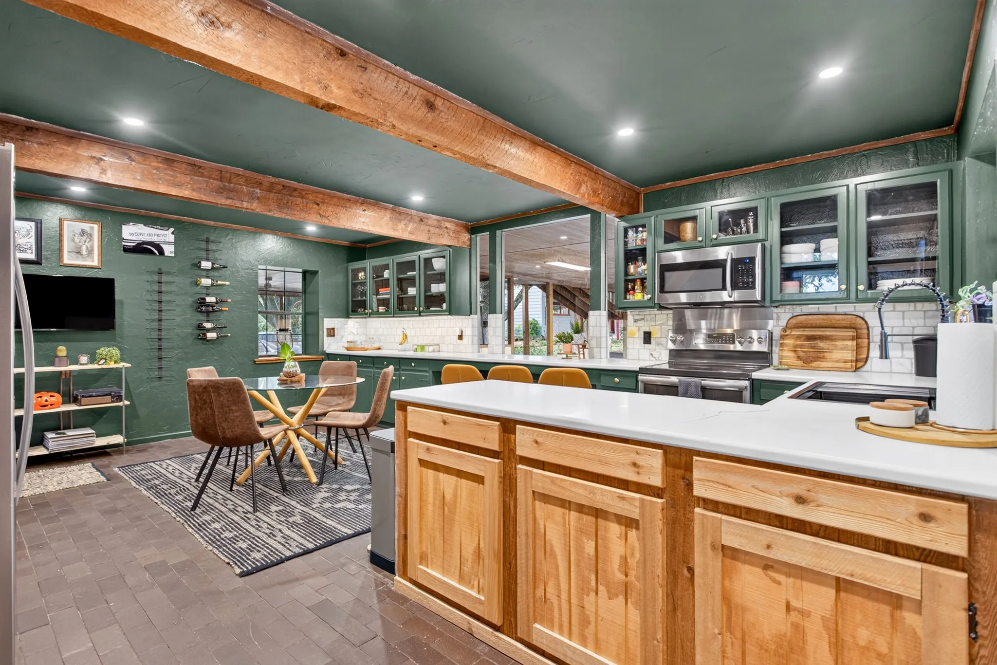 Nothing cookie cutter in here. Instead, the owners opened up the room and curated a kitchen that feels both modern and primitive at once.
