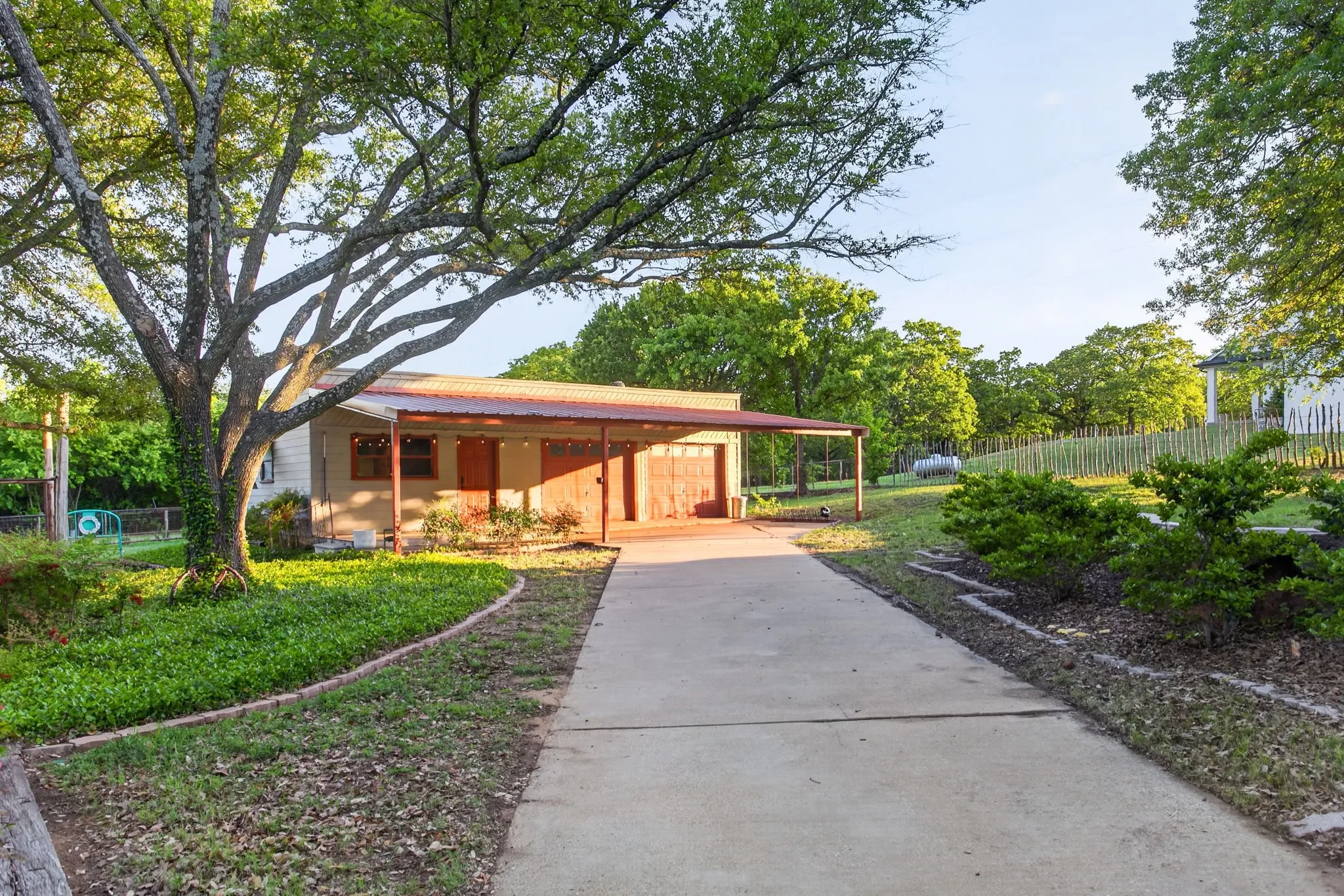 Two car garage WITH awning PLUS another super special surprise. Let's go look.