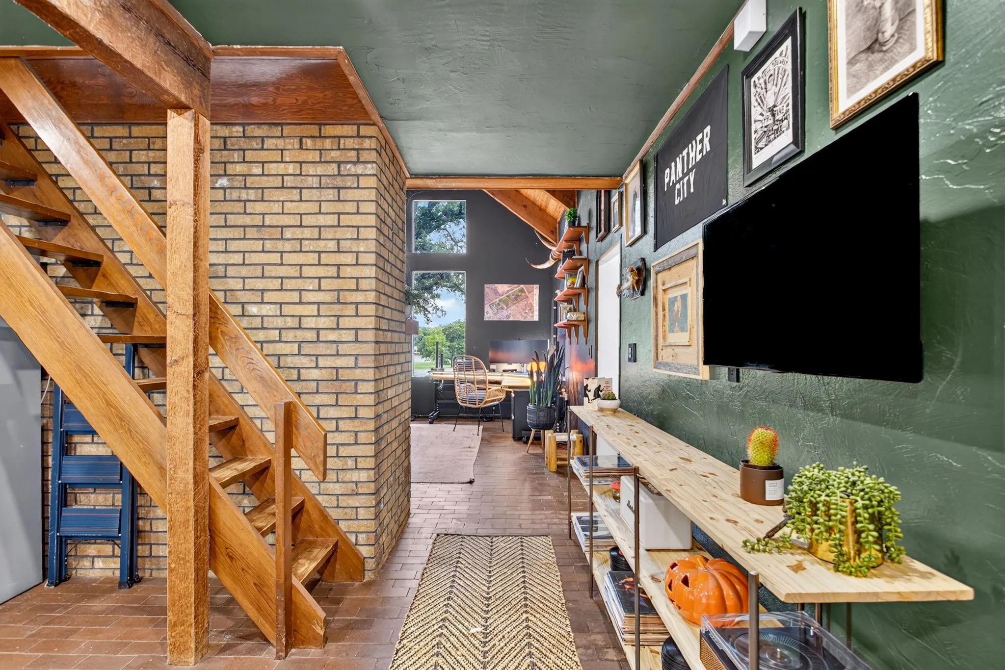 One more view towards the family room; stairs lead to a GREAT loft area.