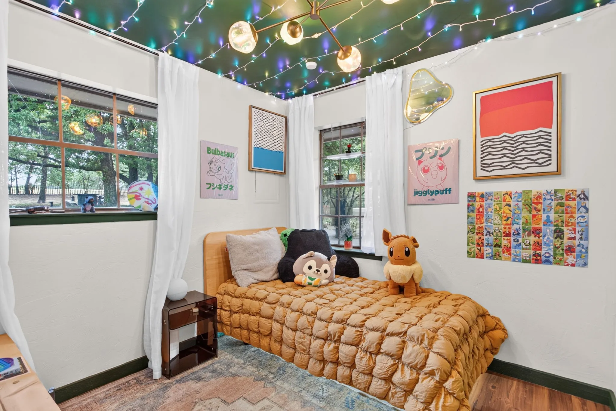 Another secondary bedroom with some fun paint and new lighting.