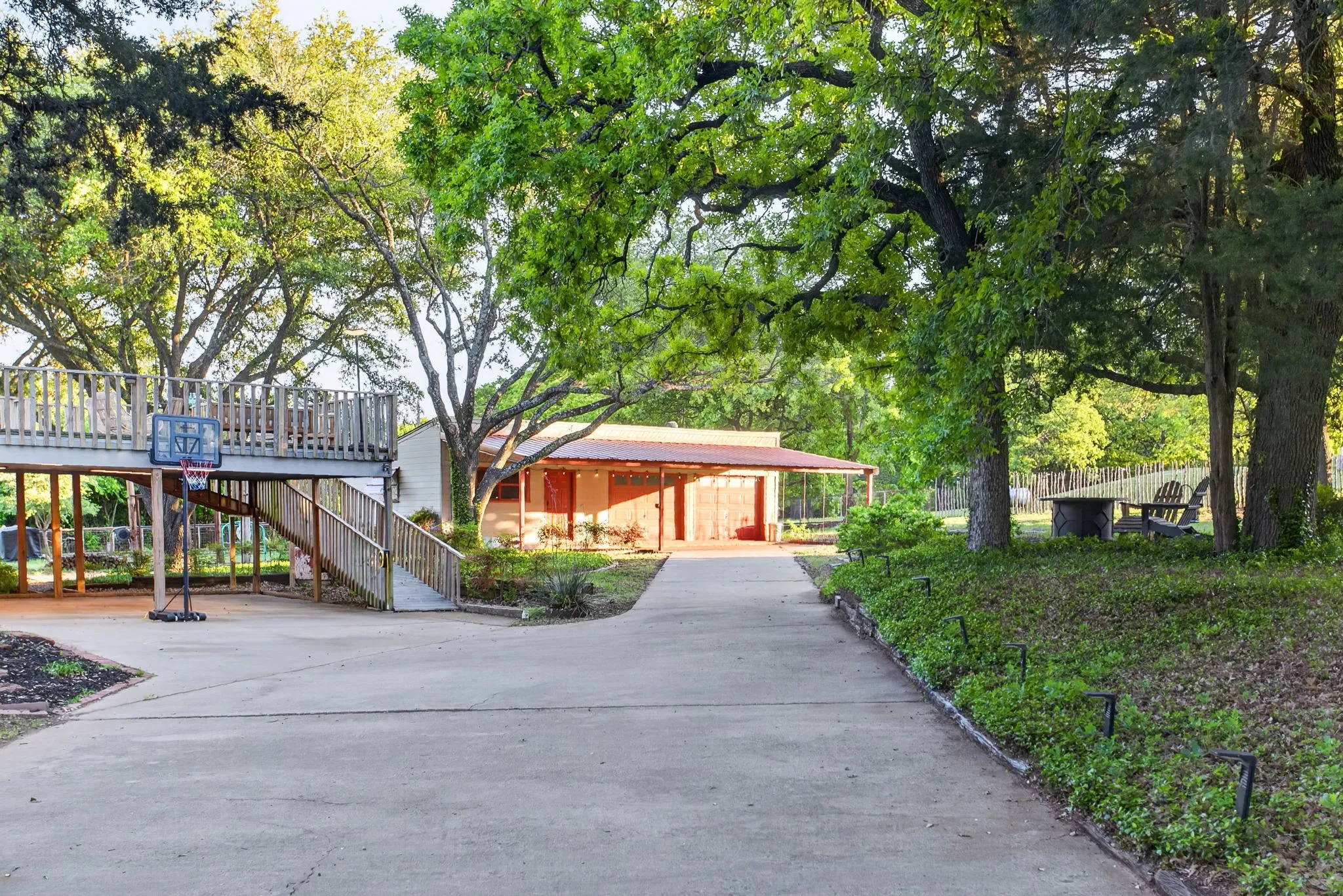 Gated drive leads to a huge covered parking area, a two-car garage plus workshop with awning...and it just keeps getting better from here.