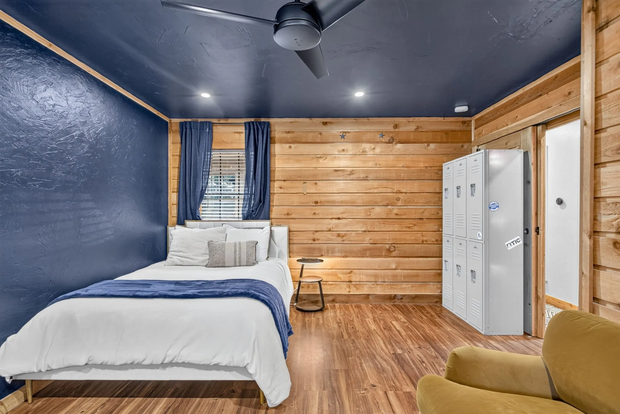 Shiplap and a sliding barn door are at home here - authentic to the property.