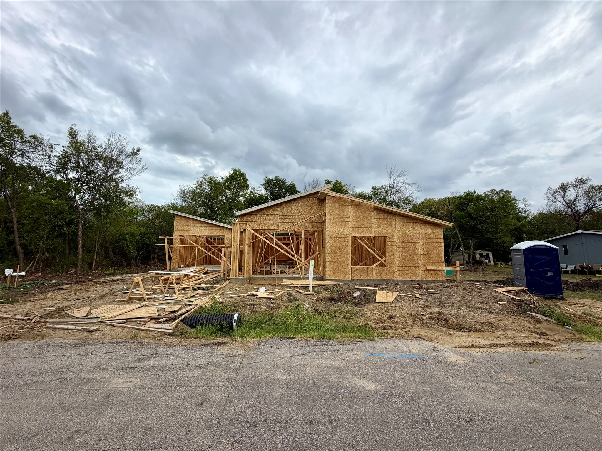 New Construction home being framed in community
