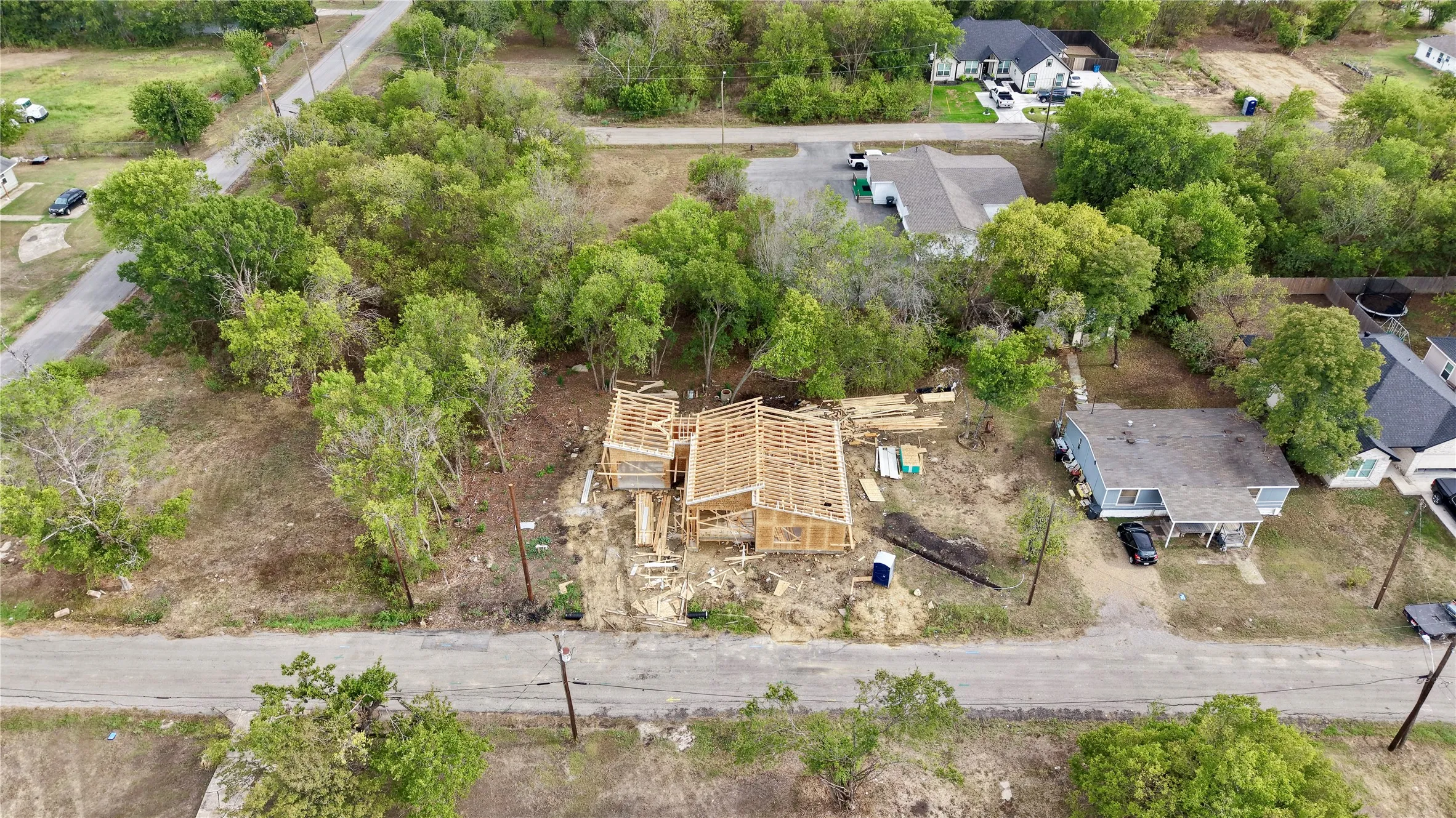New construction framing on a lot nearby