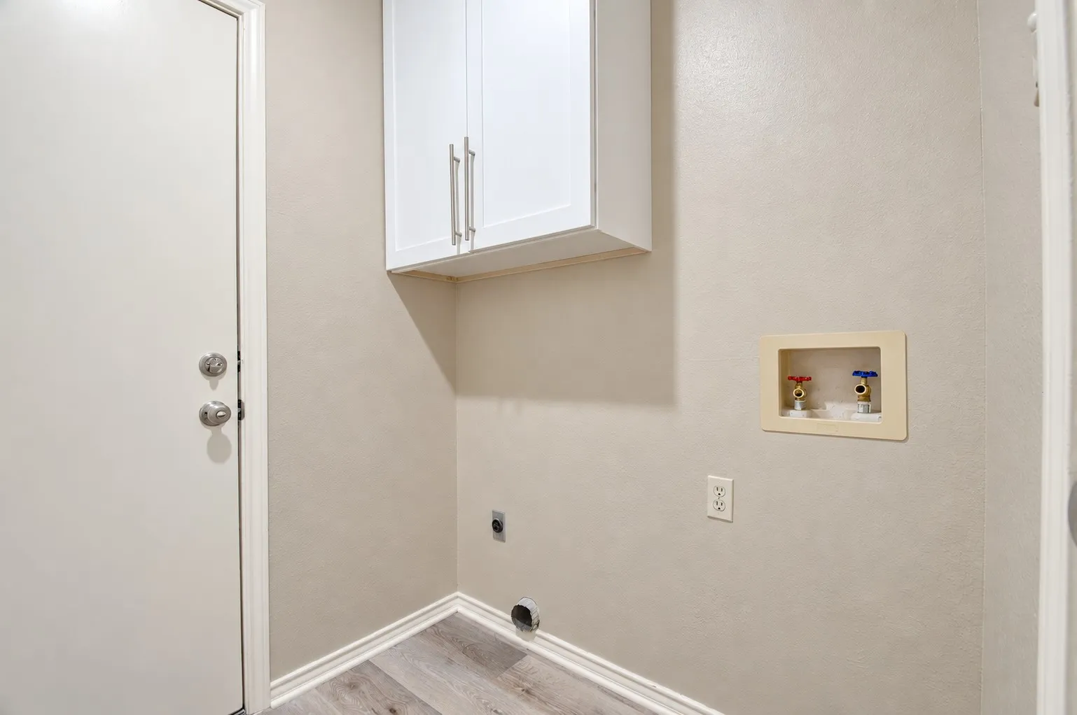 Laundry room with storage