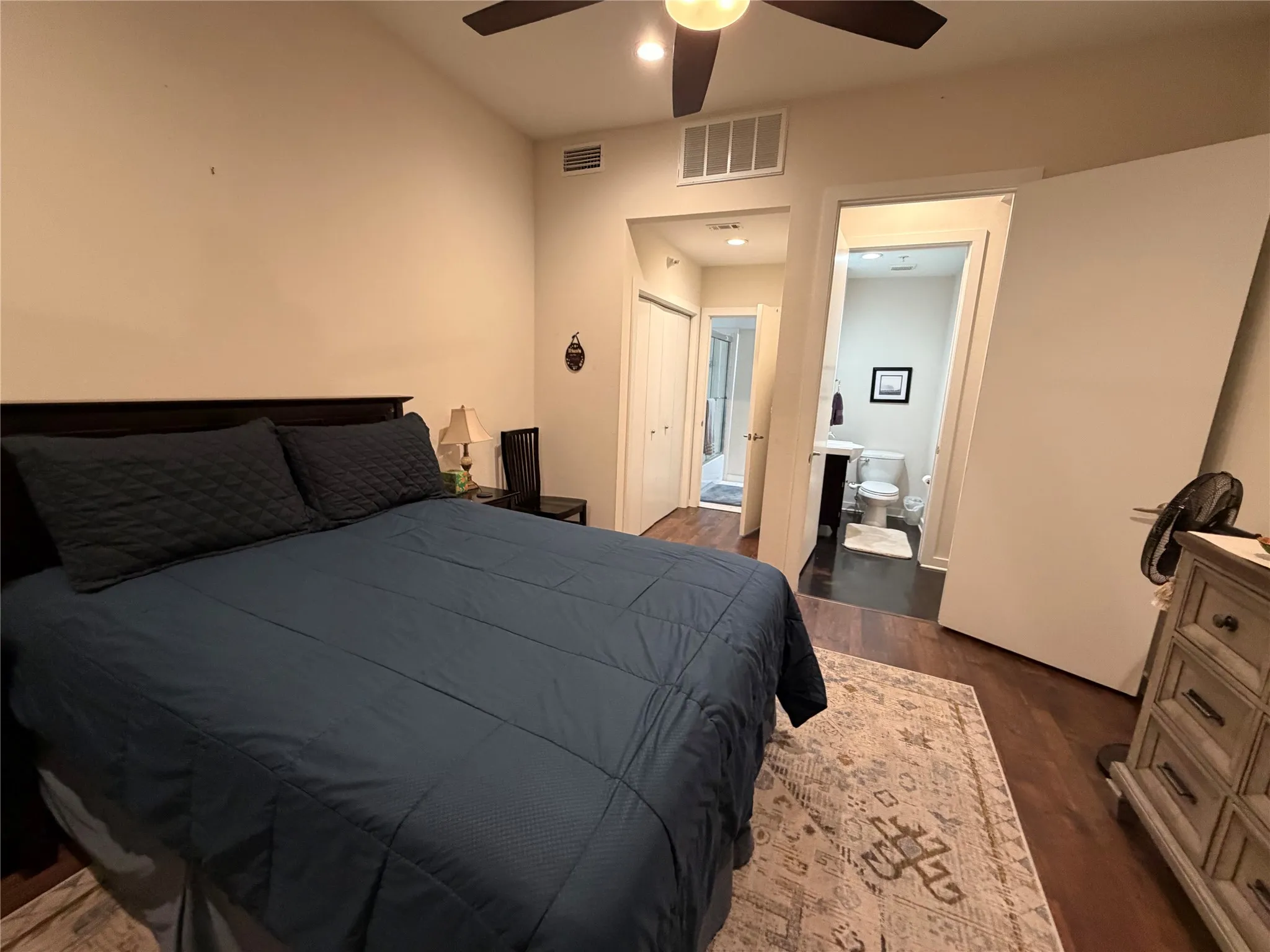 Recessed lighting, wood-finish flooring, ceiling fan, and built-in closet visible