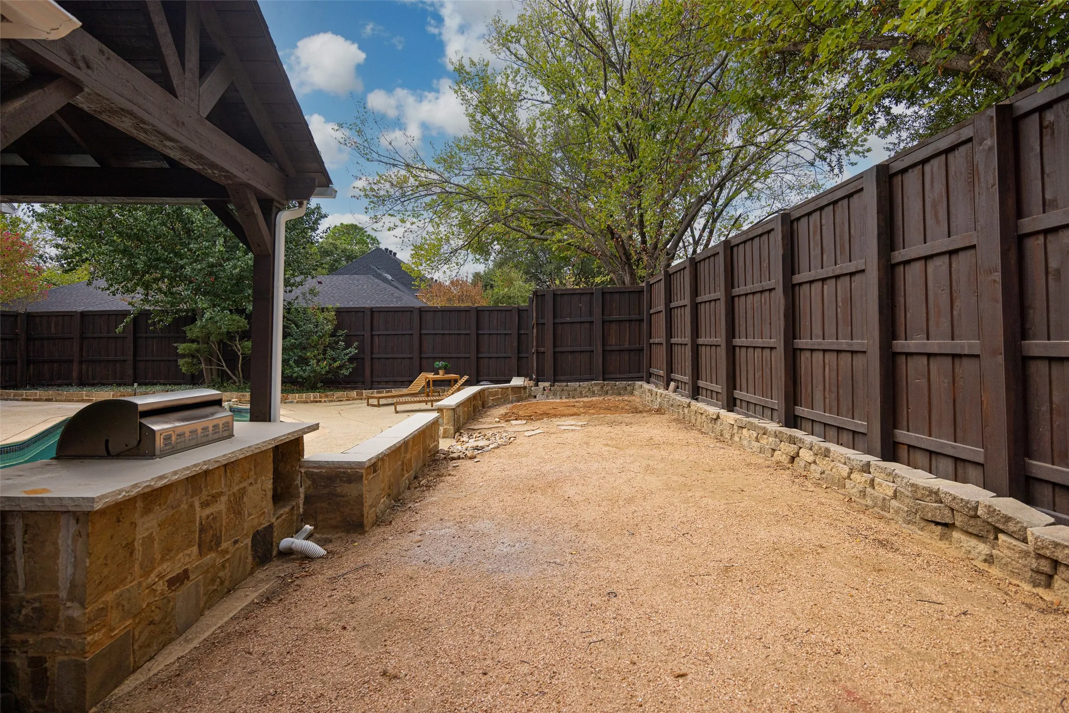 Leave as is, or bring your design inspiration to the expansive side yard. Envision it as...