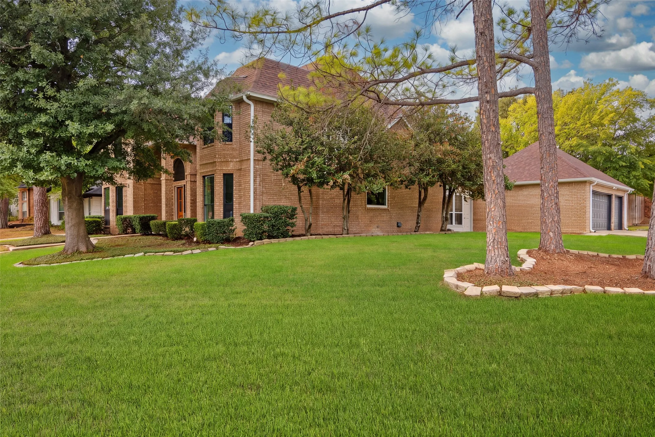 With an expansive corner lot, #2 also has a coveted 3-car garage.