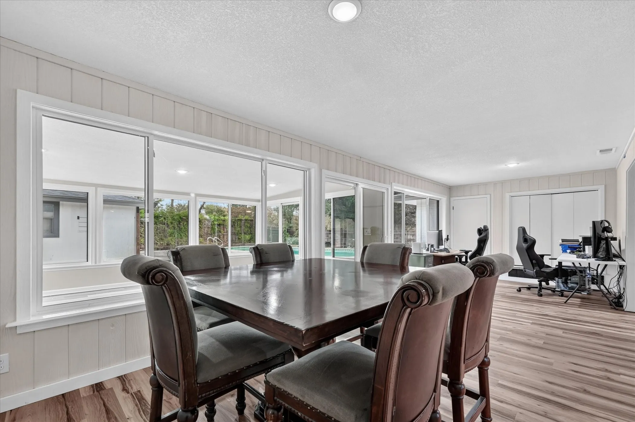 Spacious interior with wood-finish flooring and recessed lighting