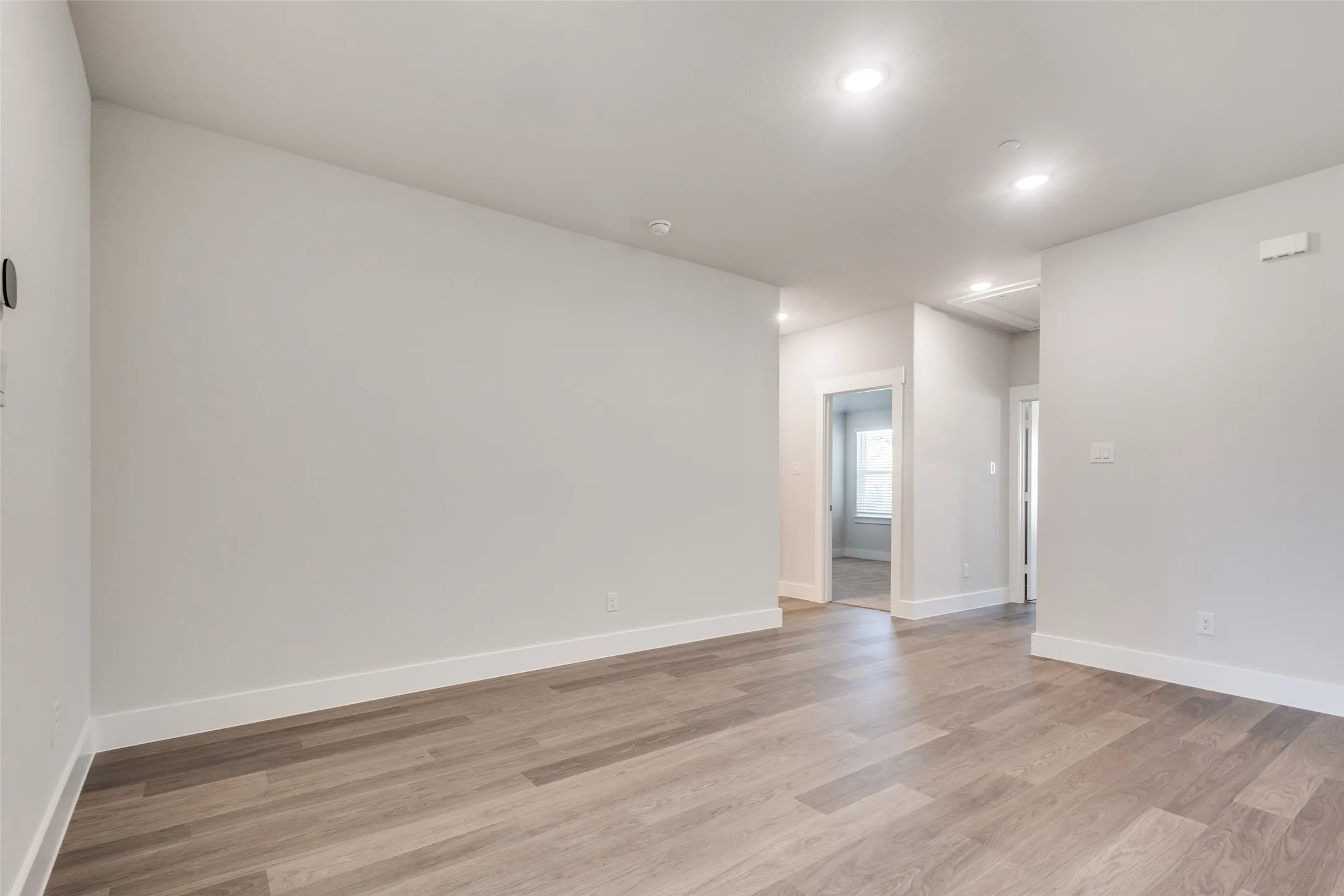 Spare room featuring light hardwood / wood-style floors
