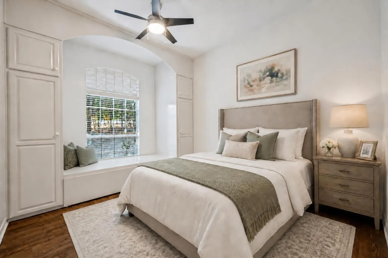 Downstairs bedroom 2 virtually staged. This space features built in closets and a hidden trundle bed around and under the window!
