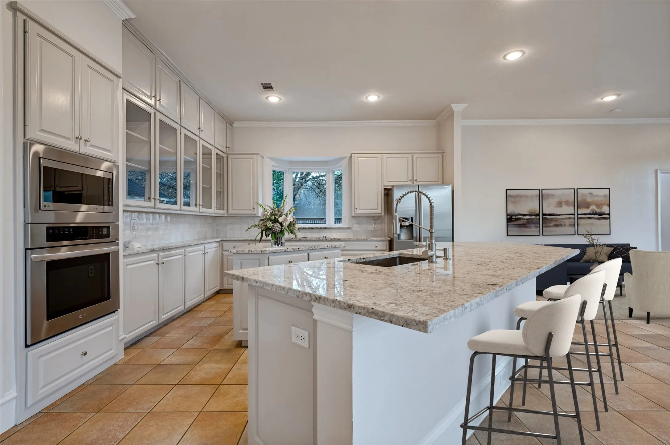 All new granite installed in Colonial White, newly painted cabinetry, & new kitchen sink and faucet. Virtually staged