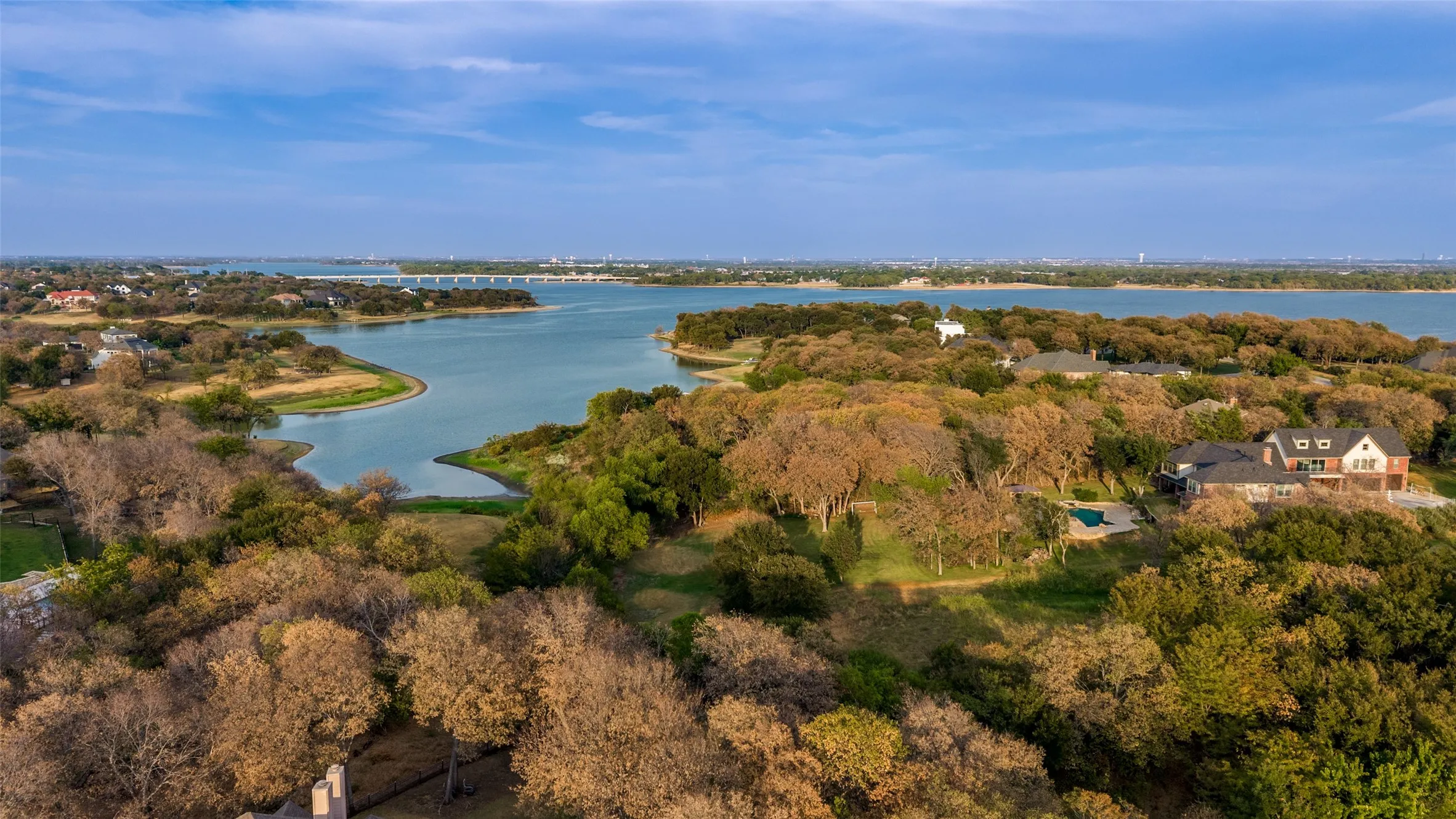 Lakeview from directly above 6565 Shoreline. Through the Corp of Engineers access off the back corner of the home, you can drag a canoe and hop in the lake!