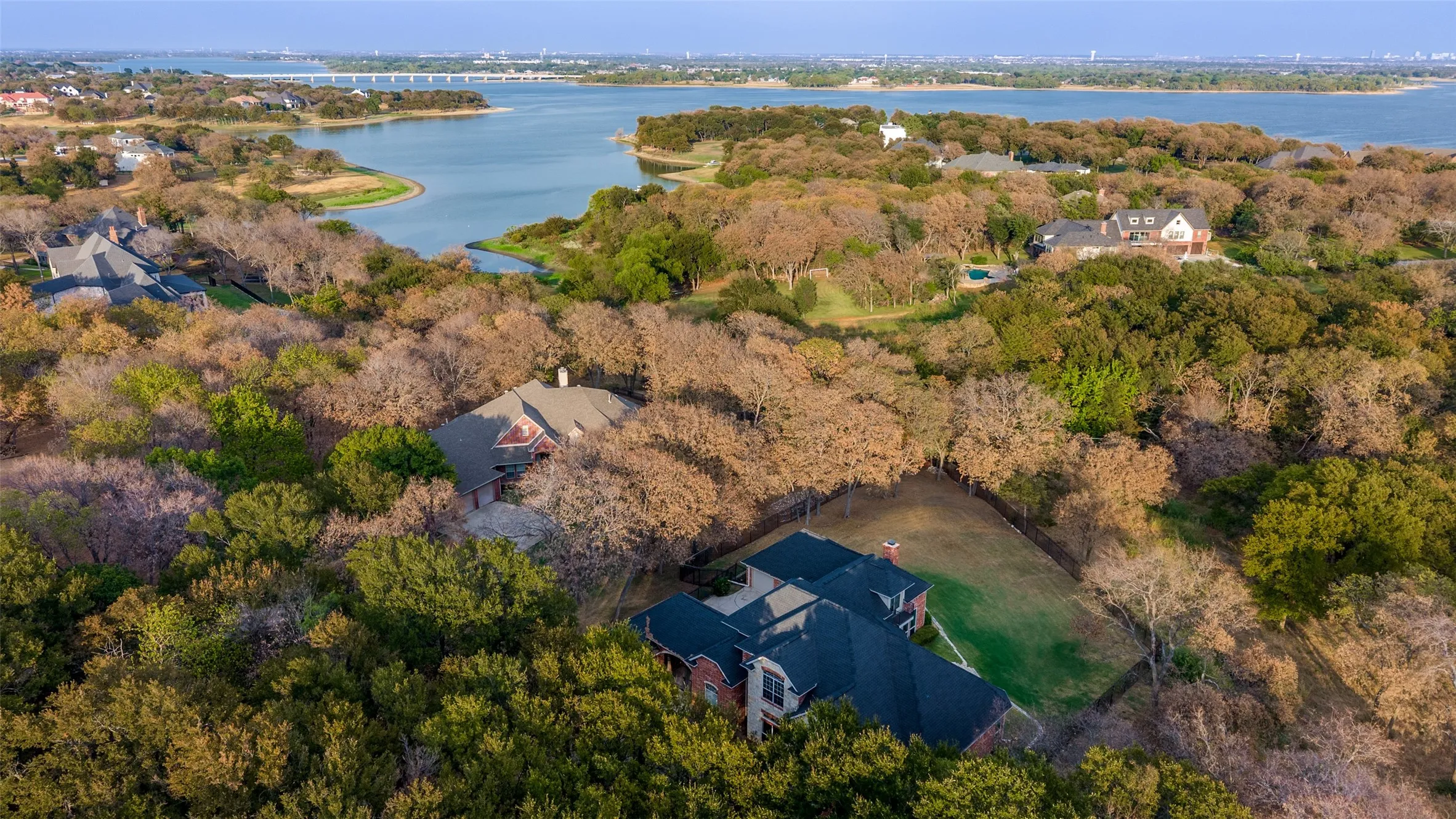 Lakeview from directly above 6565 Shoreline. Through the Corp of Engineers access off the back corner of the home, you can drag a canoe and hop in the lake!