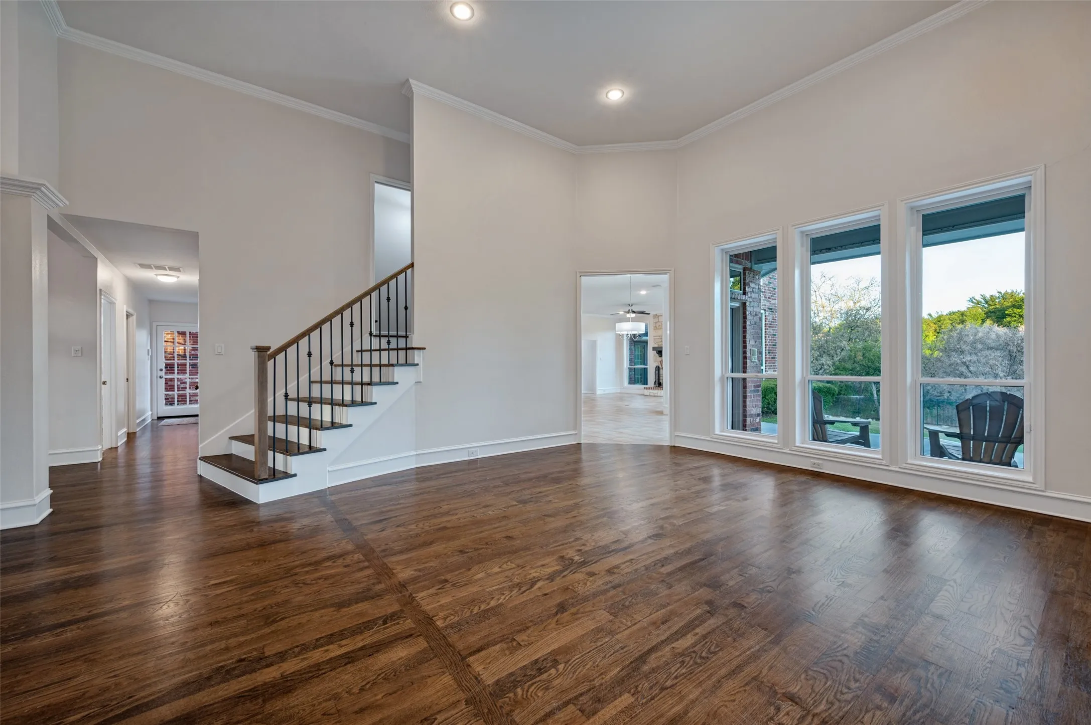 Non-virtually staged layout of the formal living and dining room upon entry of the home