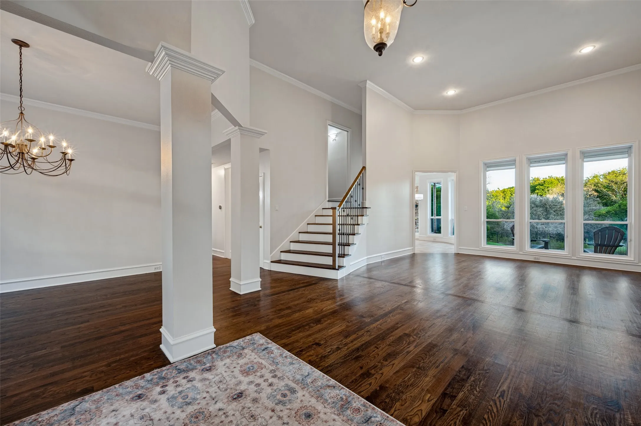 Non-virtually staged layout of the formal living and dining room upon entry of the home