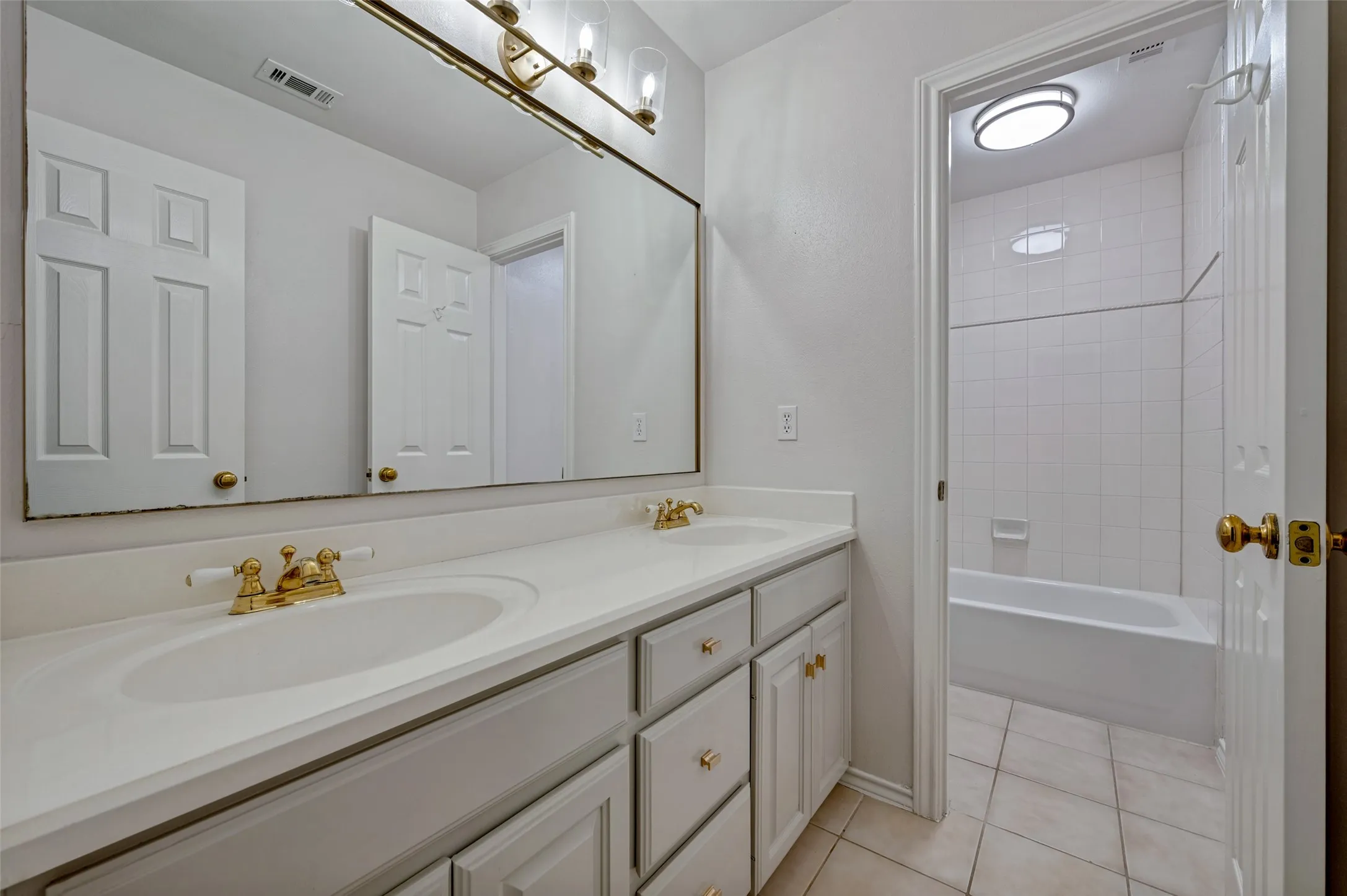Upstairs guest bathroom. This is the 3rd full bathroom