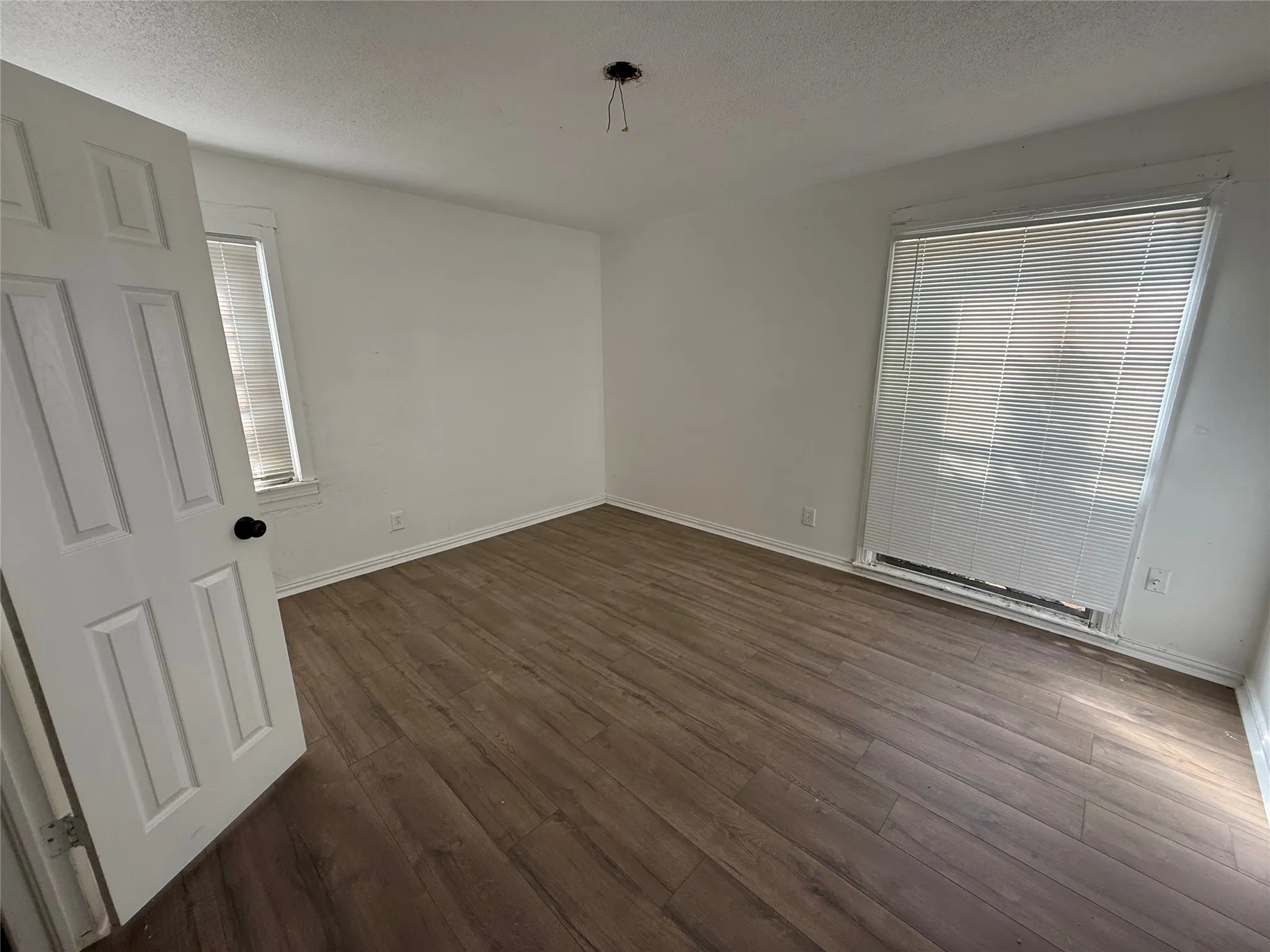 Wood-finish flooring throughout