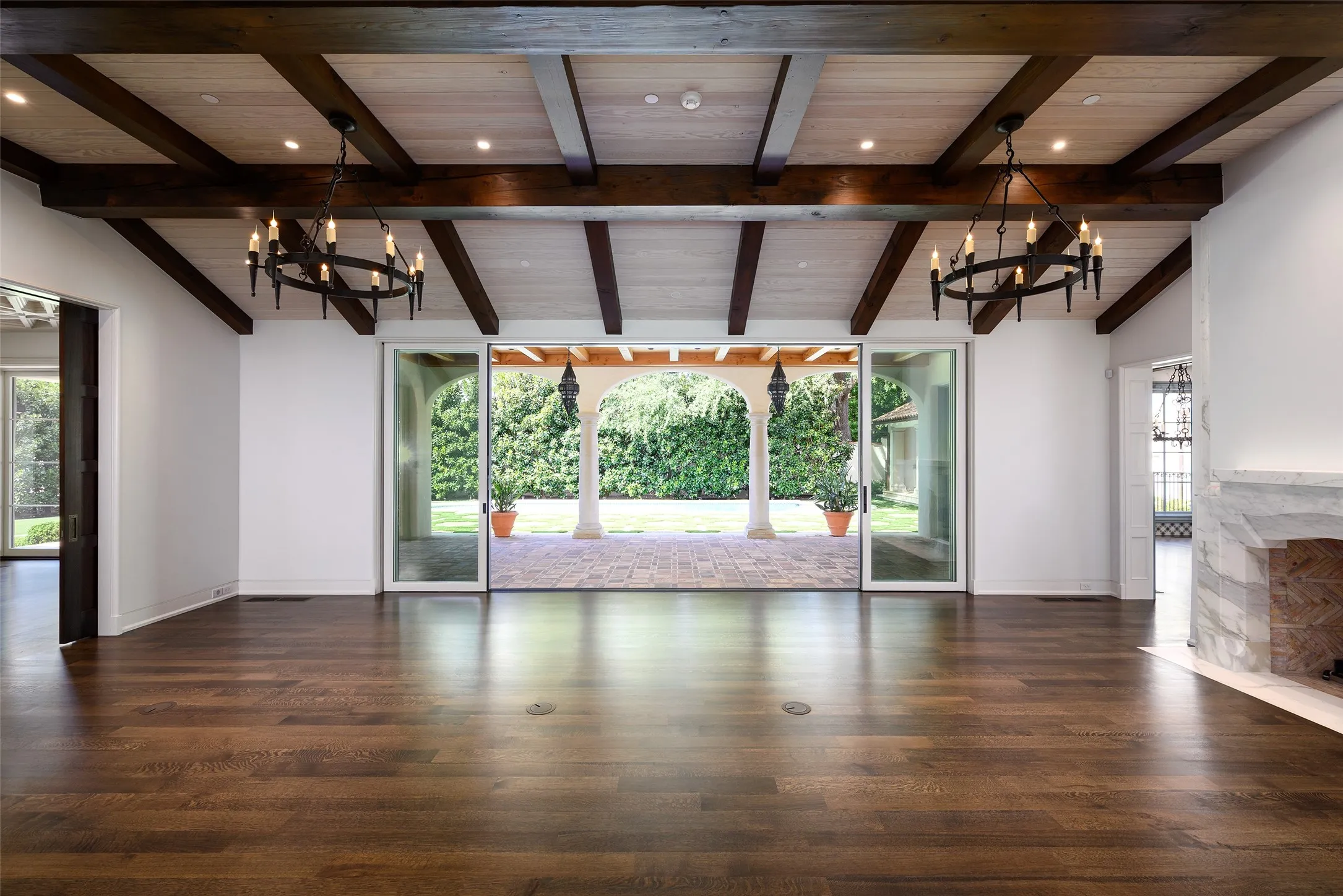 Family room open to spacious back covered patio