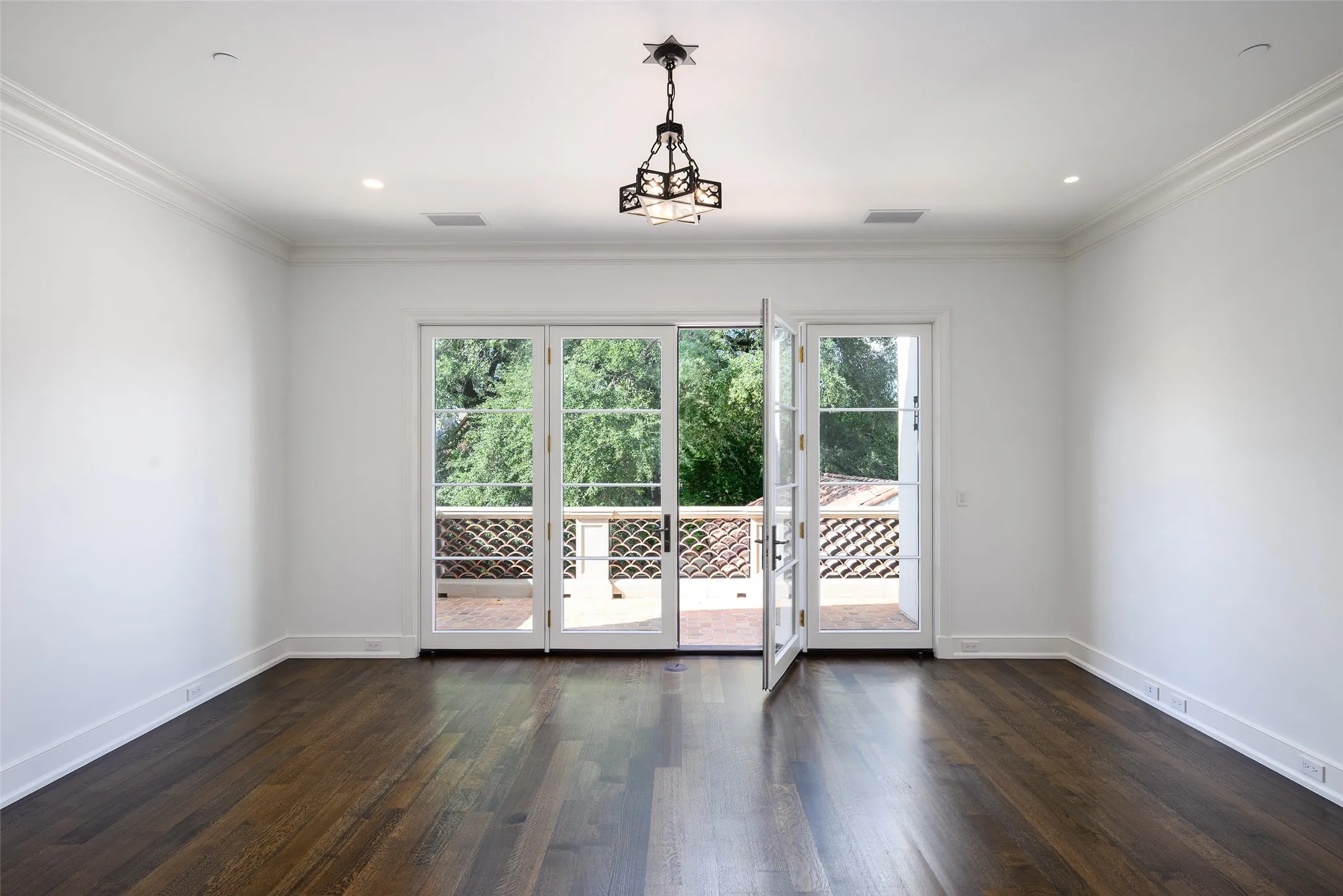 One of two Secondary Bedrooms with balconies