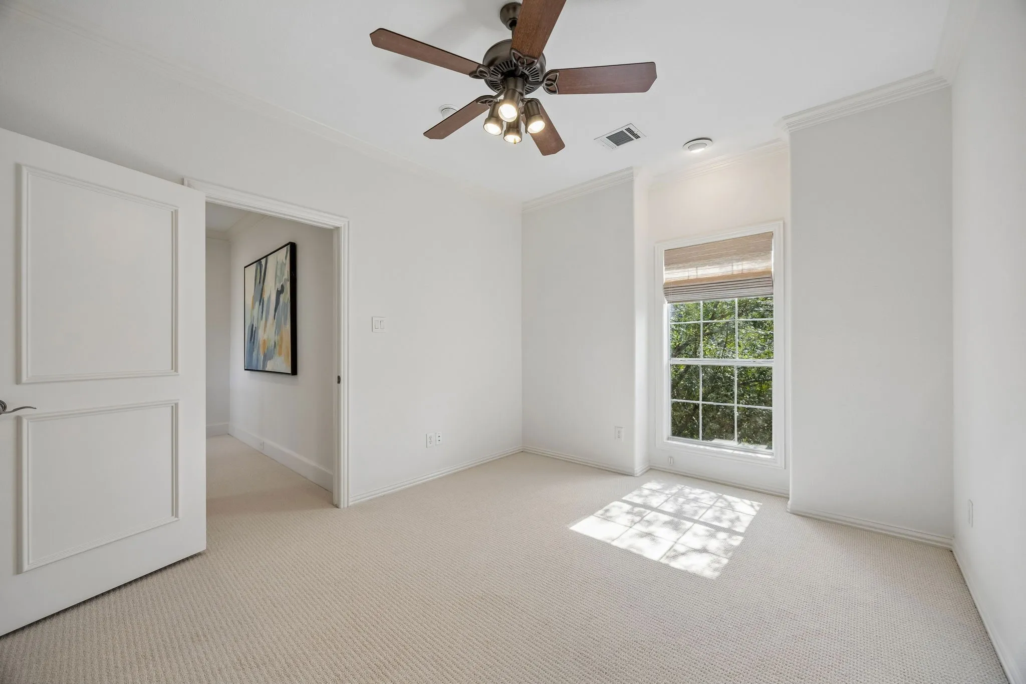 Guest suite with full bath and walk-in closet.