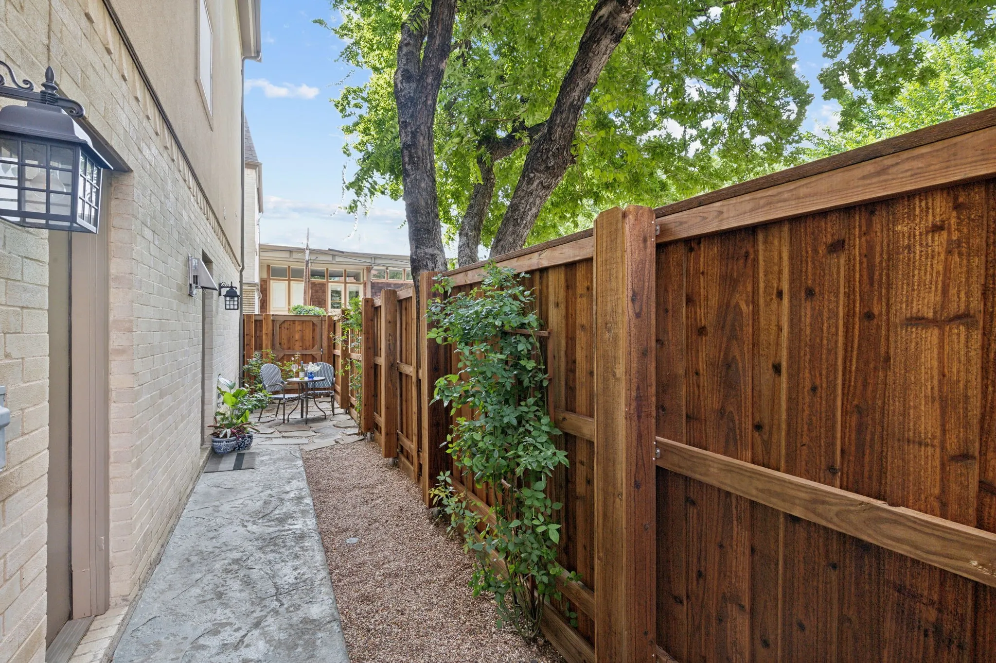 Private gated backyard with space for pets, grilling or an outdoor seating area.