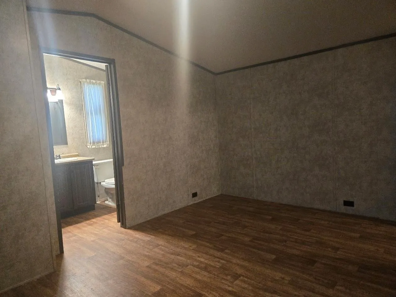 Wood-finish flooring throughout