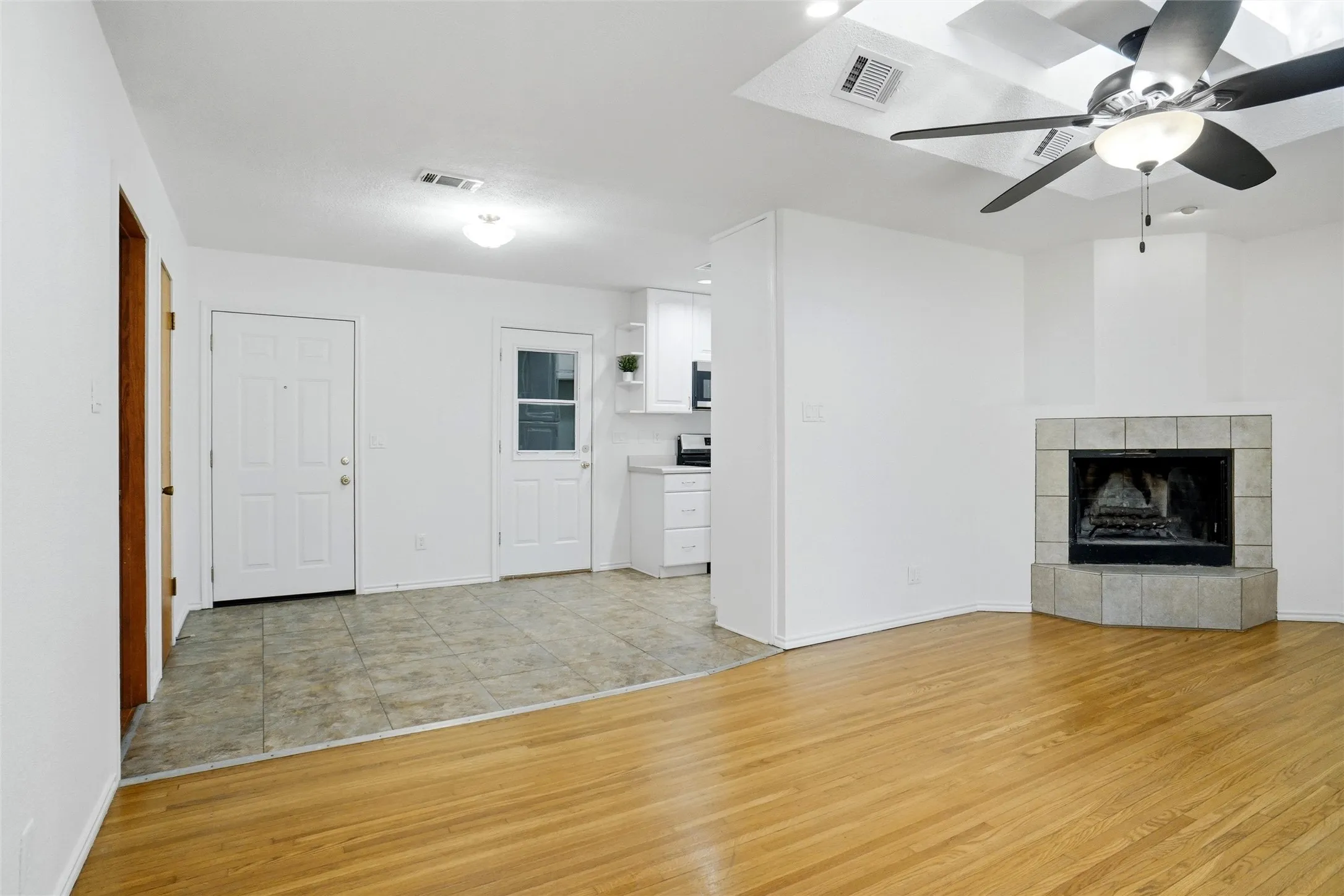 Spacious Living Rm can be used as a combination Living & Dining space. View of Entry.