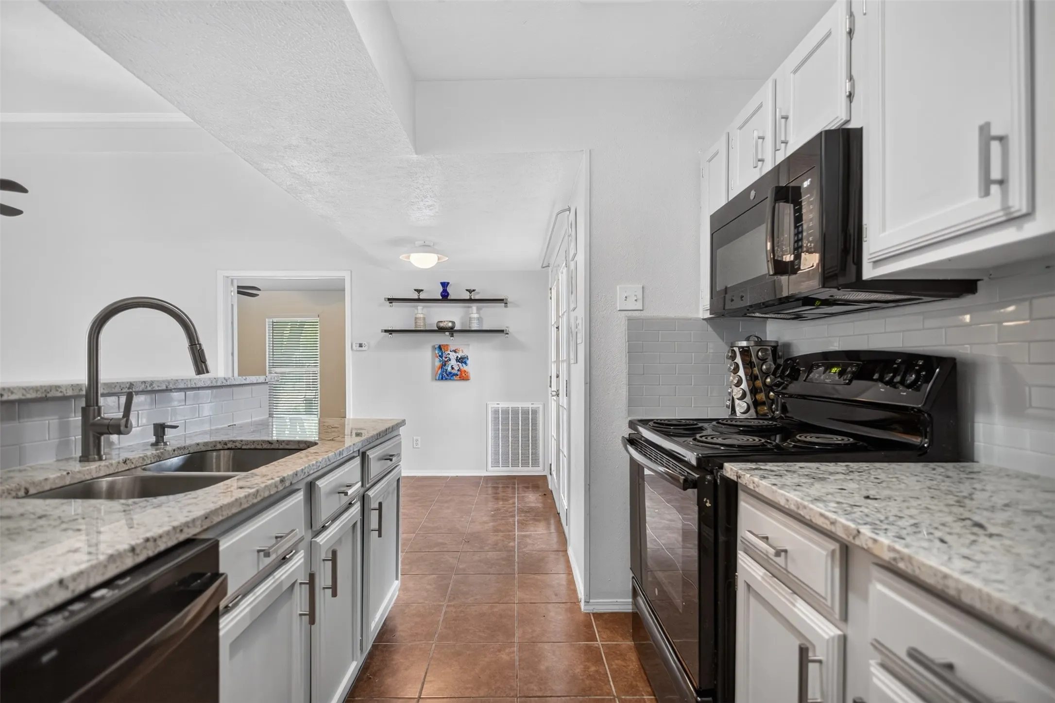 Black Appliances, Deep Stainless Steel Sink