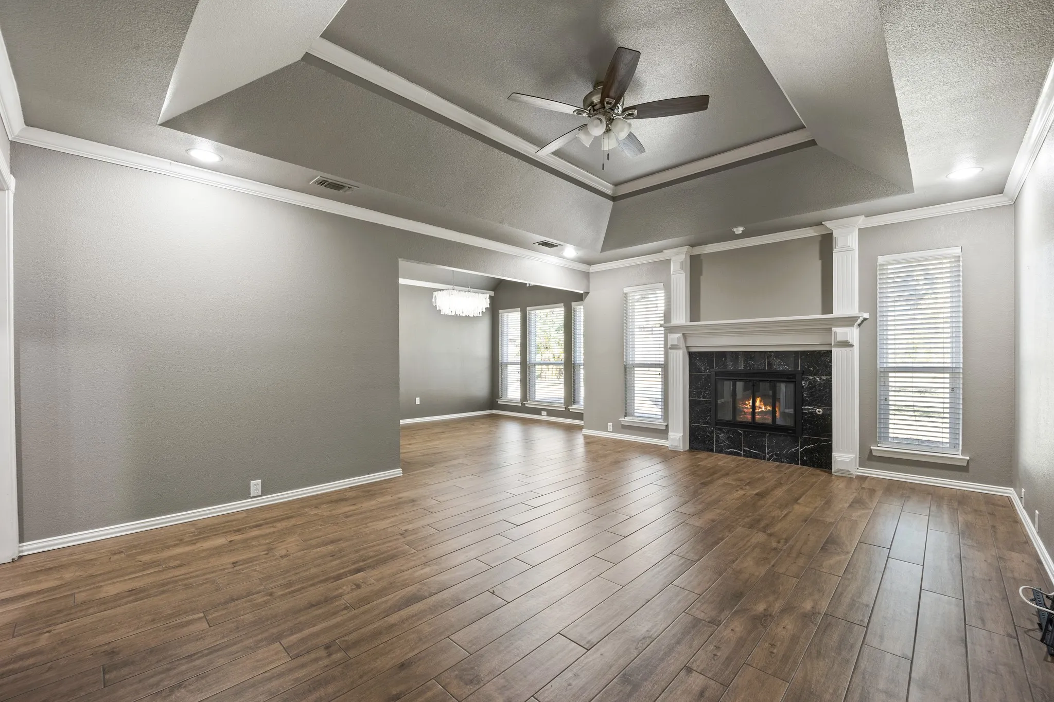 Wood-look ceramic title flooring.