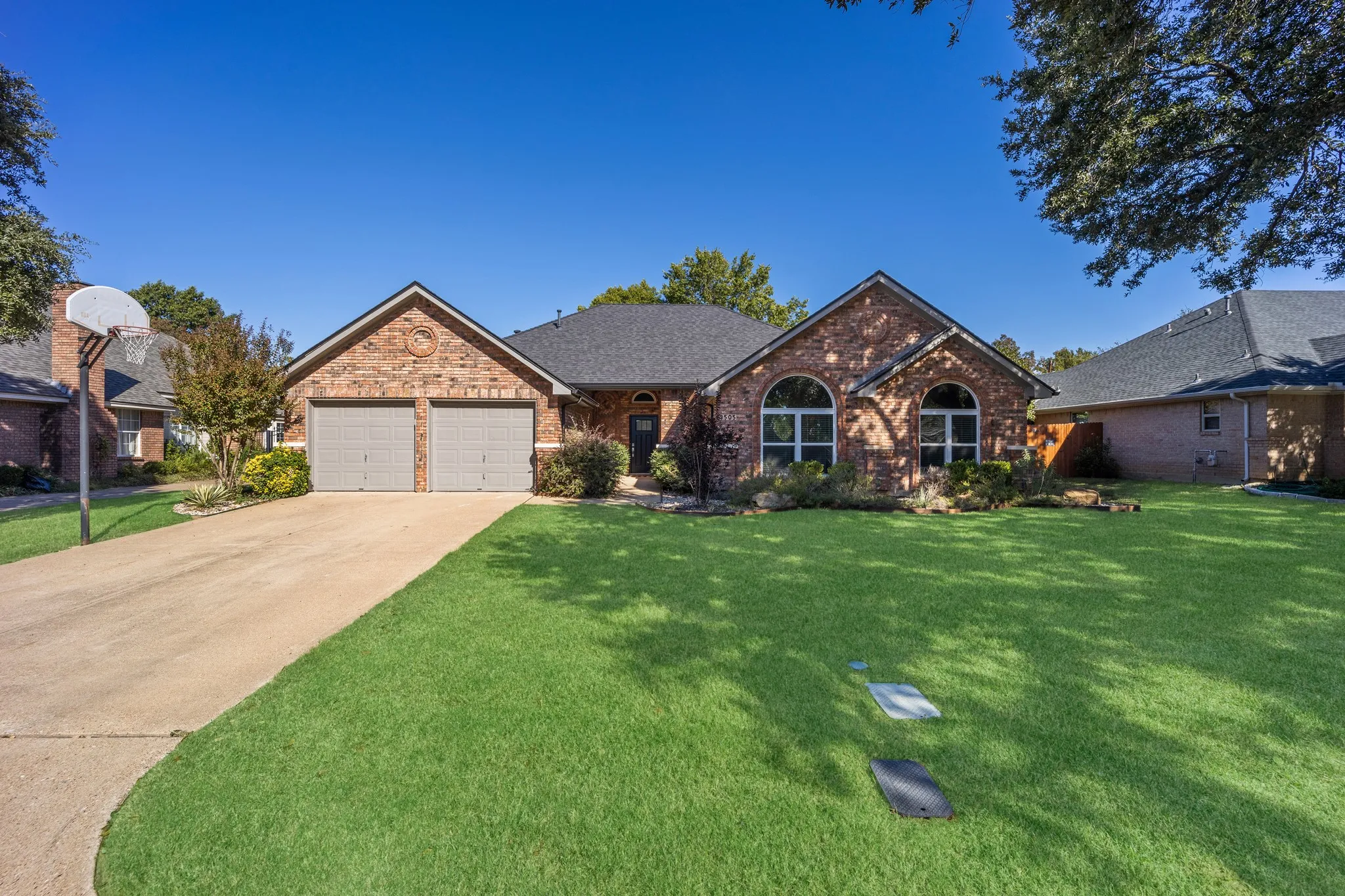 Beautiful drive up appeal on a wide Colleyville street.