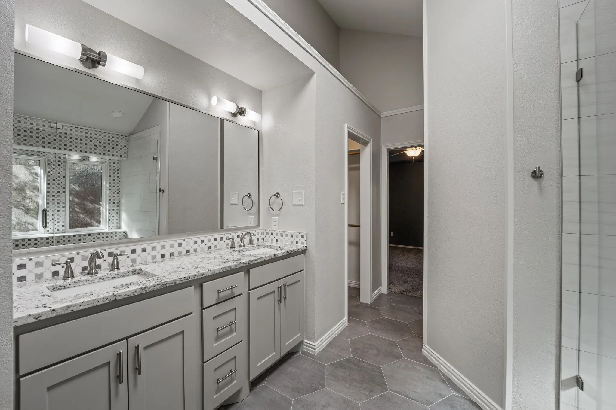 Dual sinks in primary bathroom.