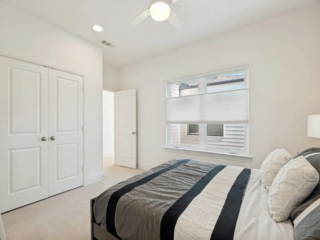 Recessed lighting and ceiling fan overhead