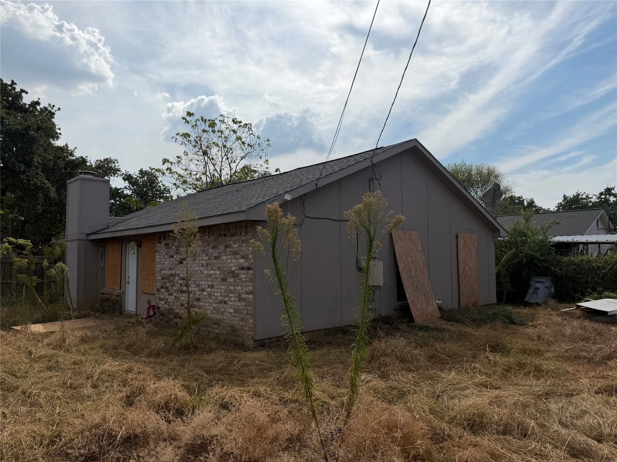 Single-story structure with a gray shingle roof