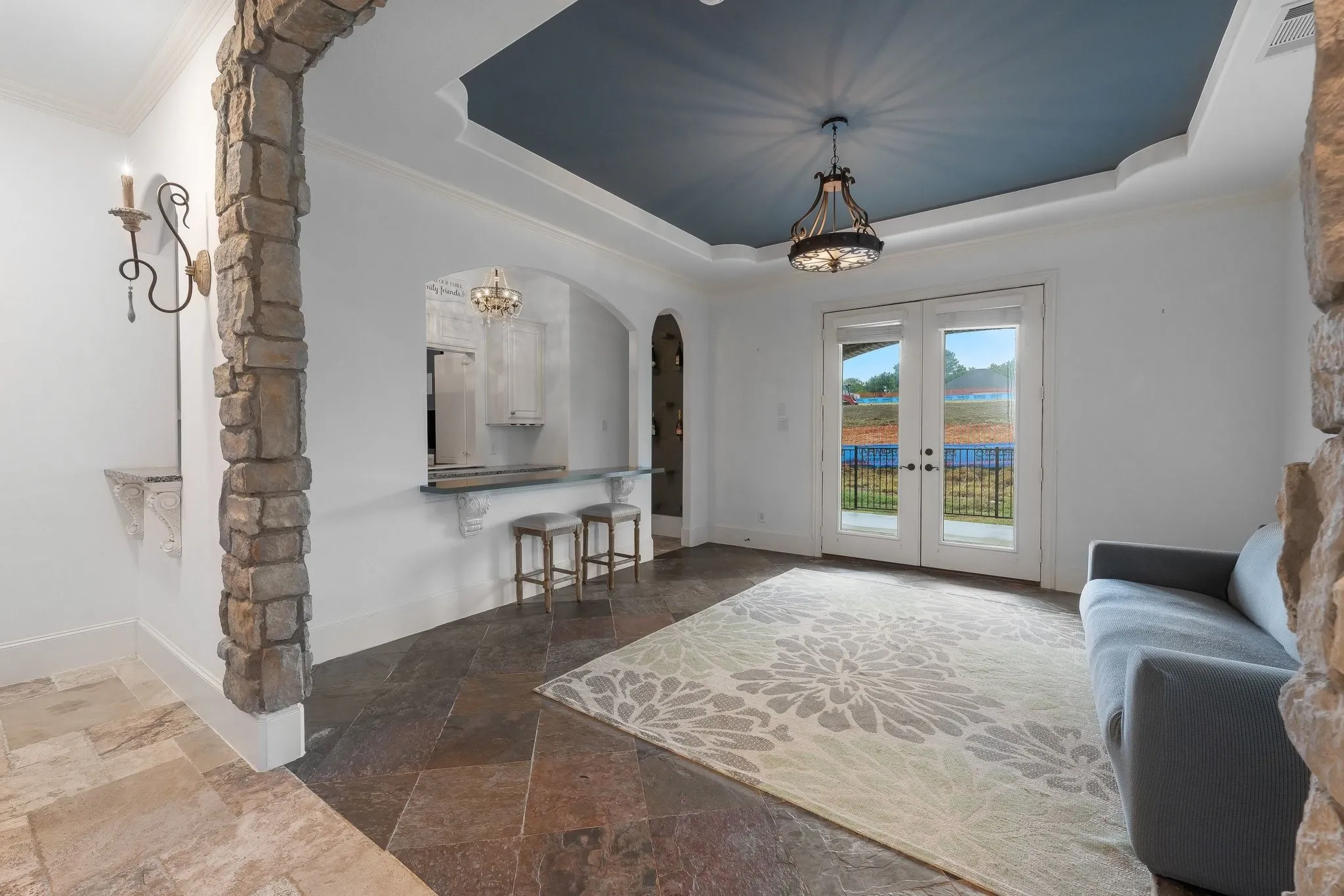 Game room has direct access to the large side patio.