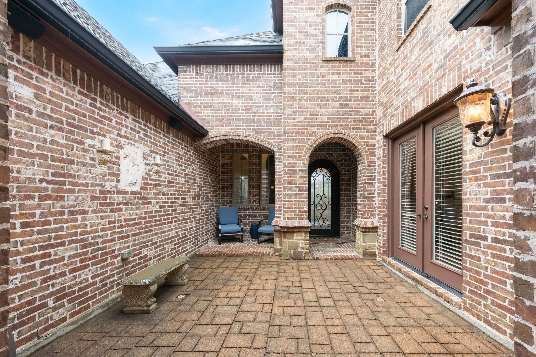 Private open-air courtyard provides access to the main home entry and the private guest suite.