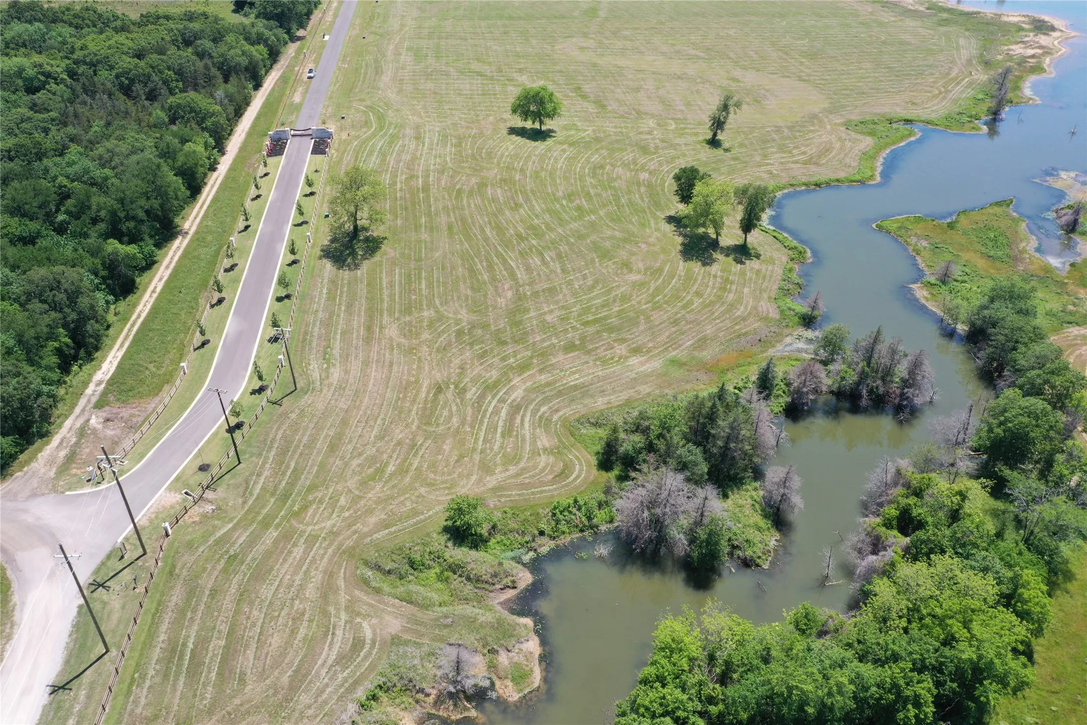 Lot view showing water and Shores entrance